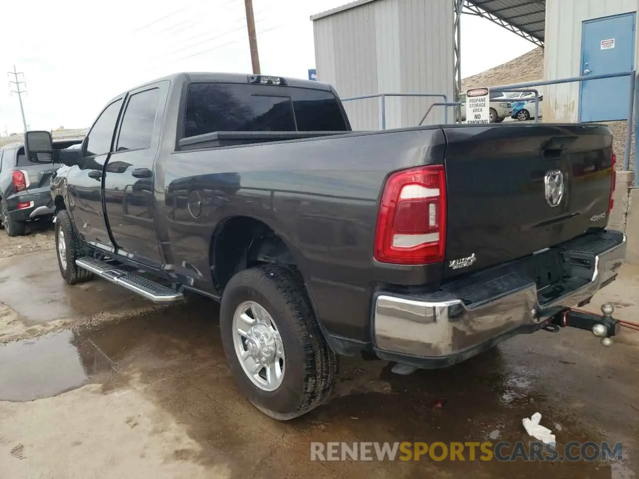 2 Photograph of a damaged car 3C6UR5CL4RG356686 RAM 2500 2024