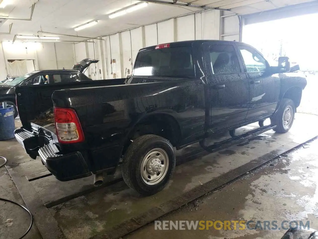 3 Photograph of a damaged car 3C6UR5CL4RG375481 RAM 2500 2024