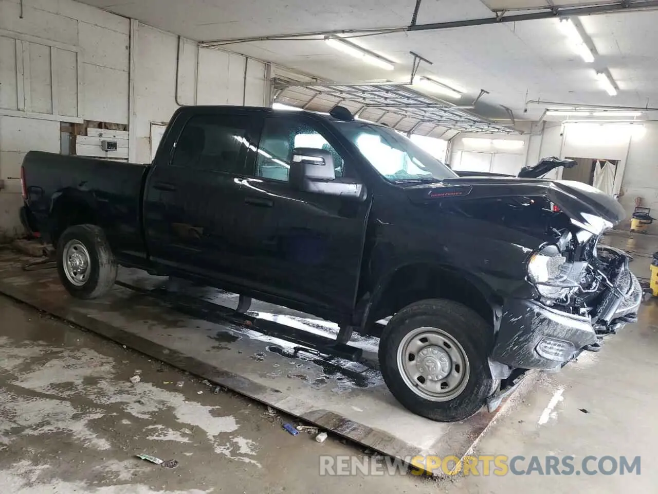 4 Photograph of a damaged car 3C6UR5CL4RG375481 RAM 2500 2024