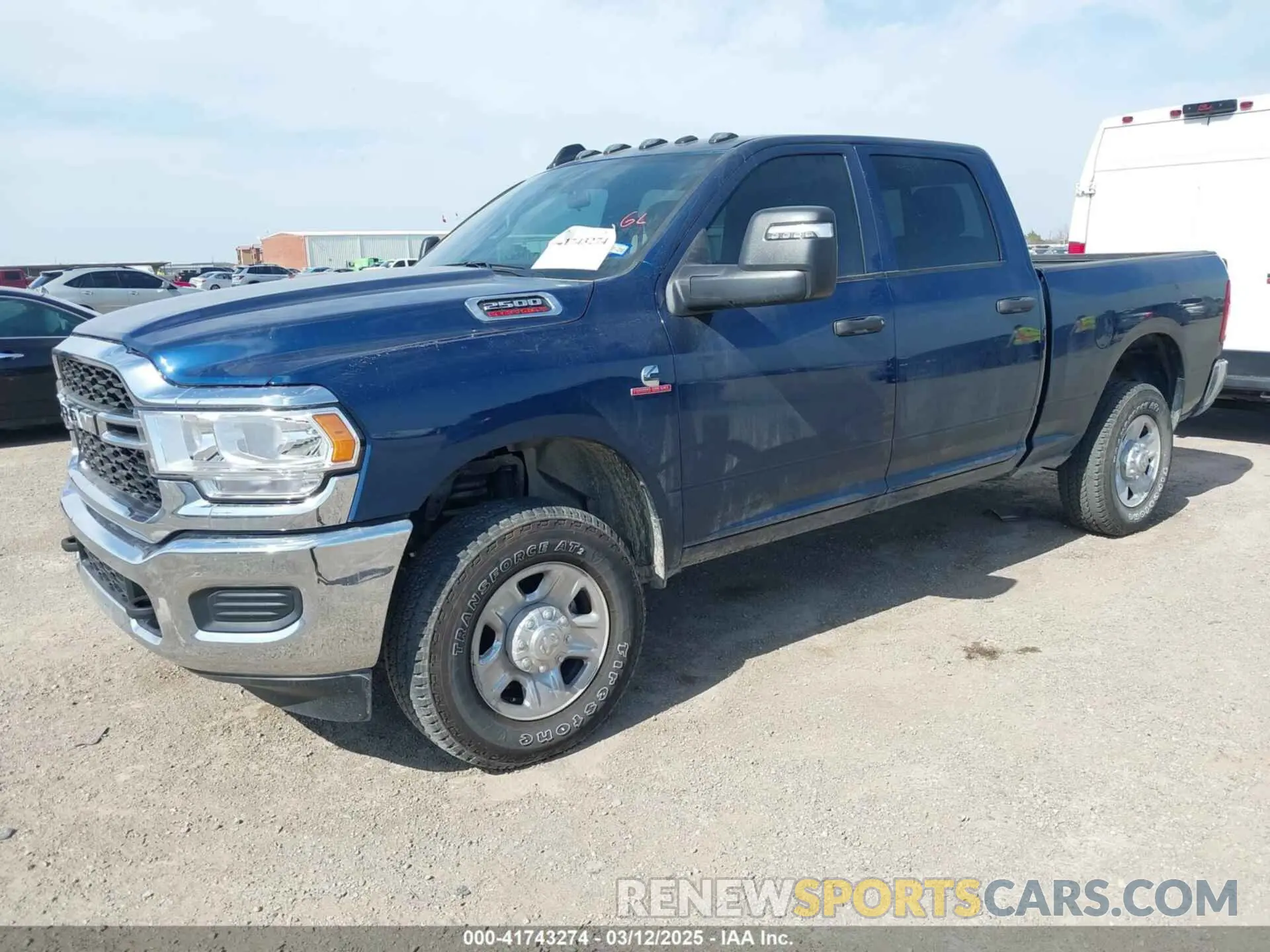 2 Photograph of a damaged car 3C6UR5CL5RG238601 RAM 2500 2024