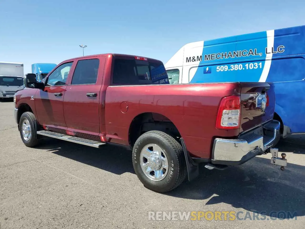 2 Photograph of a damaged car 3C6UR5CL7RG118234 RAM 2500 2024