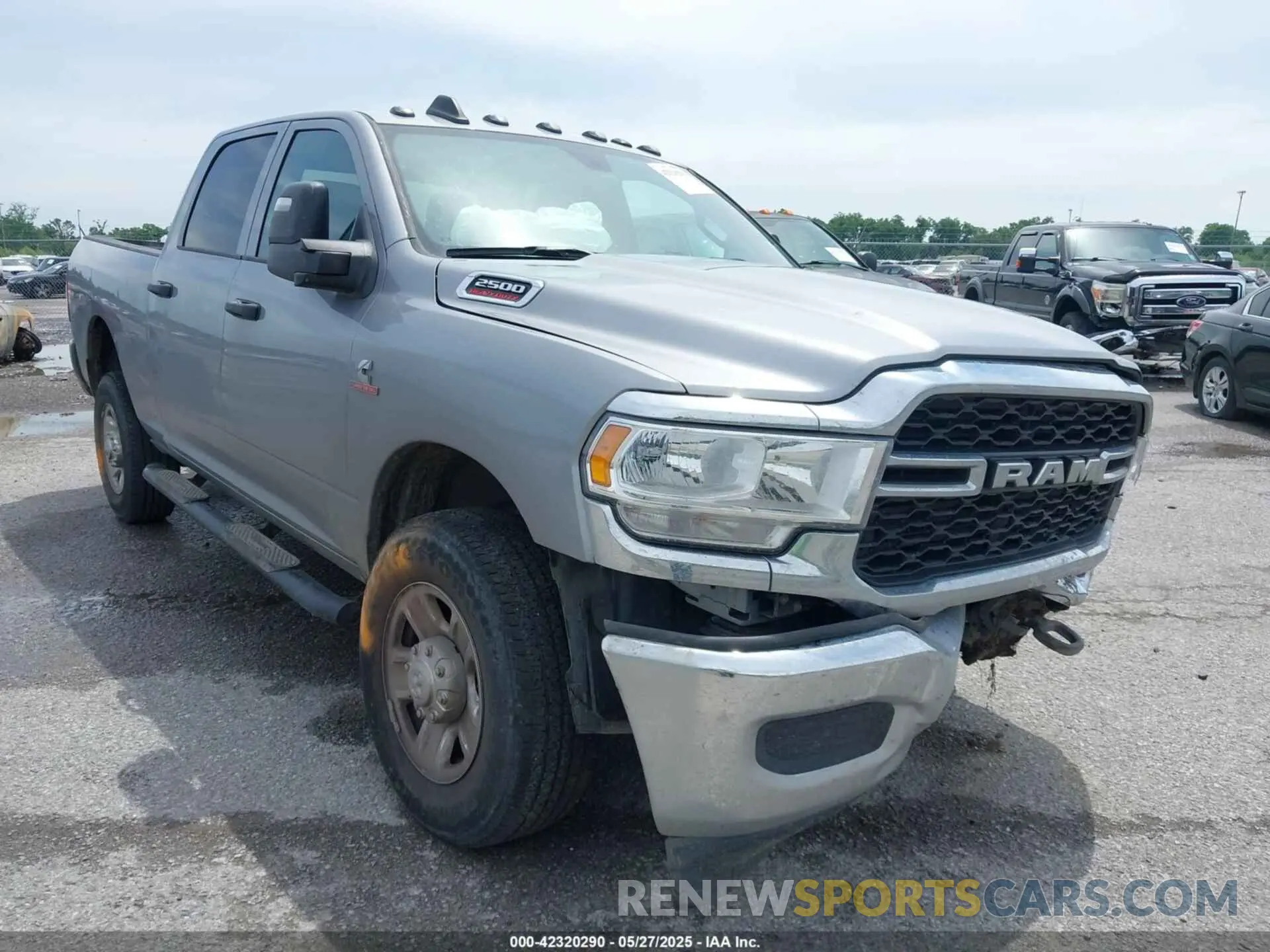 1 Photograph of a damaged car 3C6UR5CL7RG294071 RAM 2500 2024
