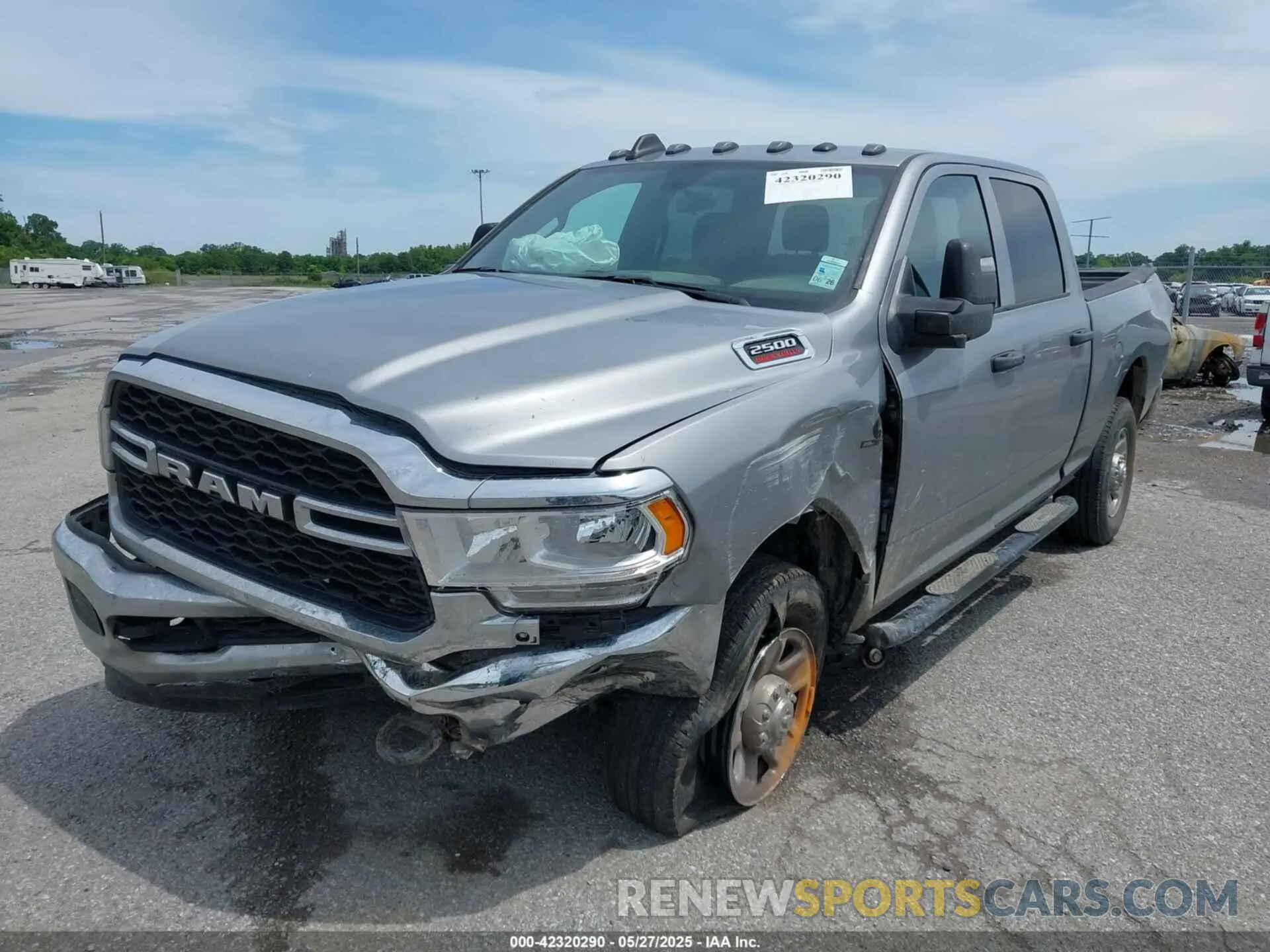 2 Photograph of a damaged car 3C6UR5CL7RG294071 RAM 2500 2024