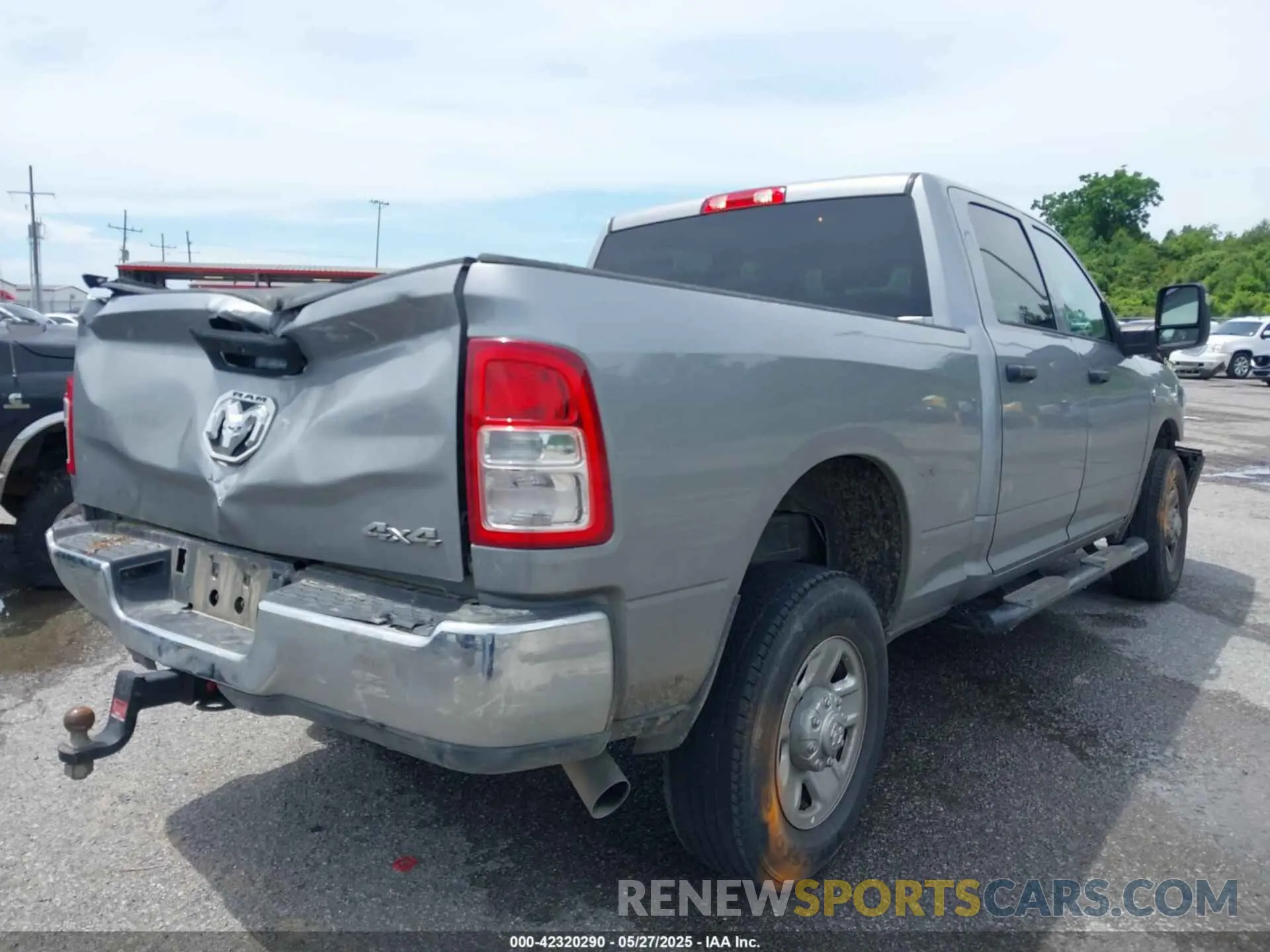 4 Photograph of a damaged car 3C6UR5CL7RG294071 RAM 2500 2024