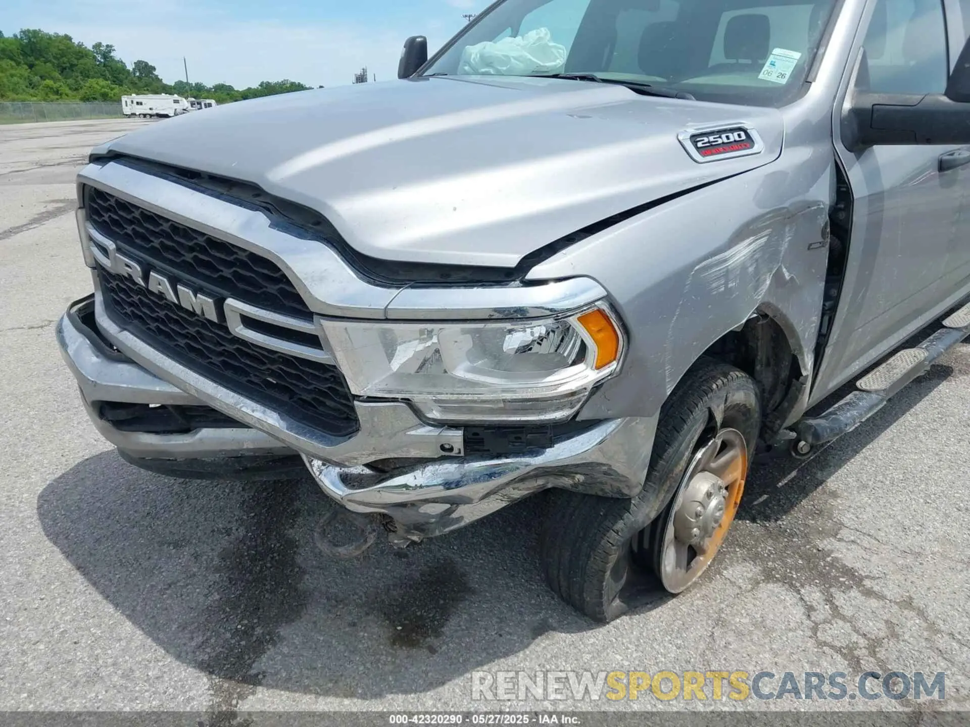 6 Photograph of a damaged car 3C6UR5CL7RG294071 RAM 2500 2024