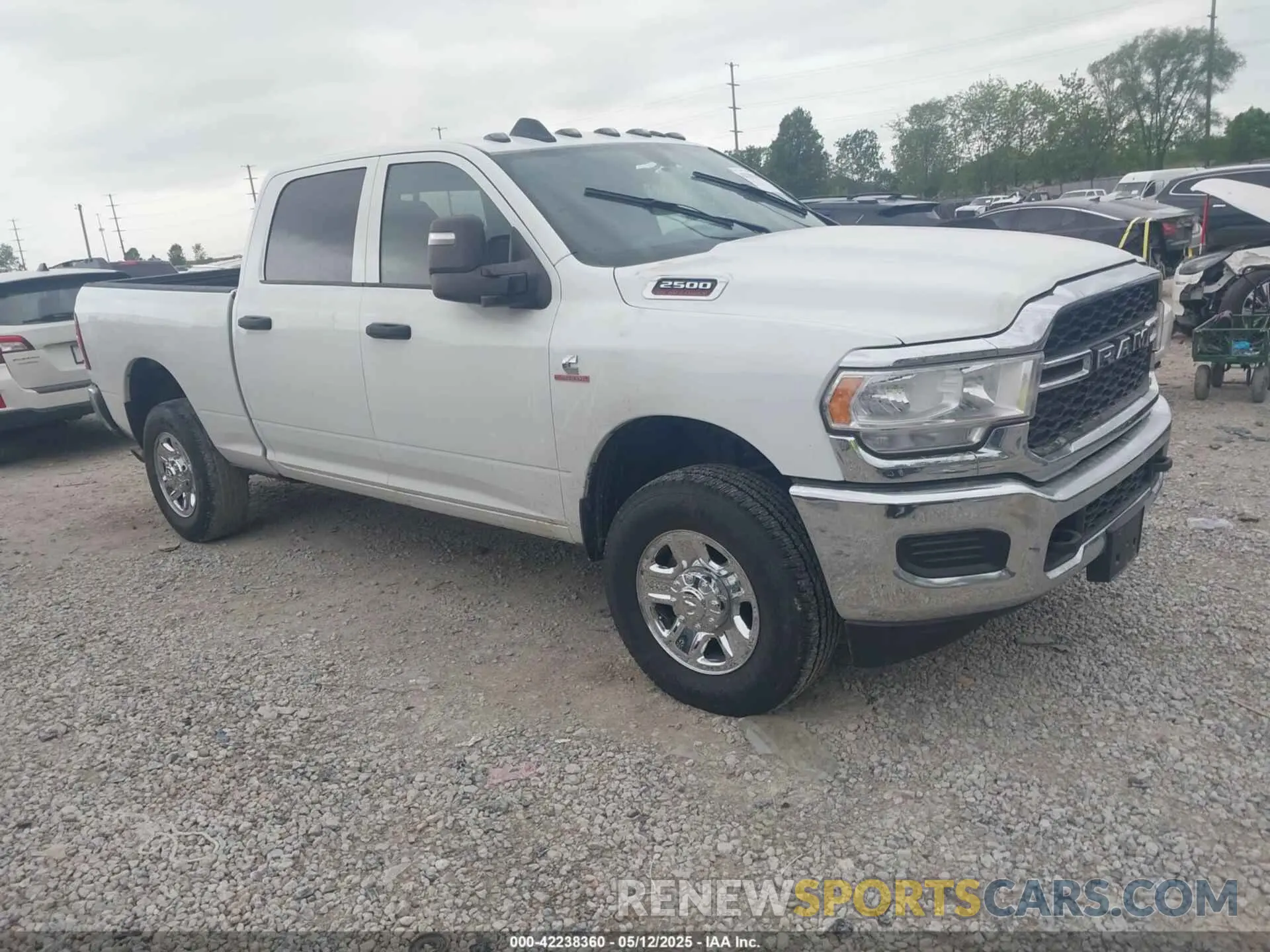 1 Photograph of a damaged car 3C6UR5CL7RG309801 RAM 2500 2024