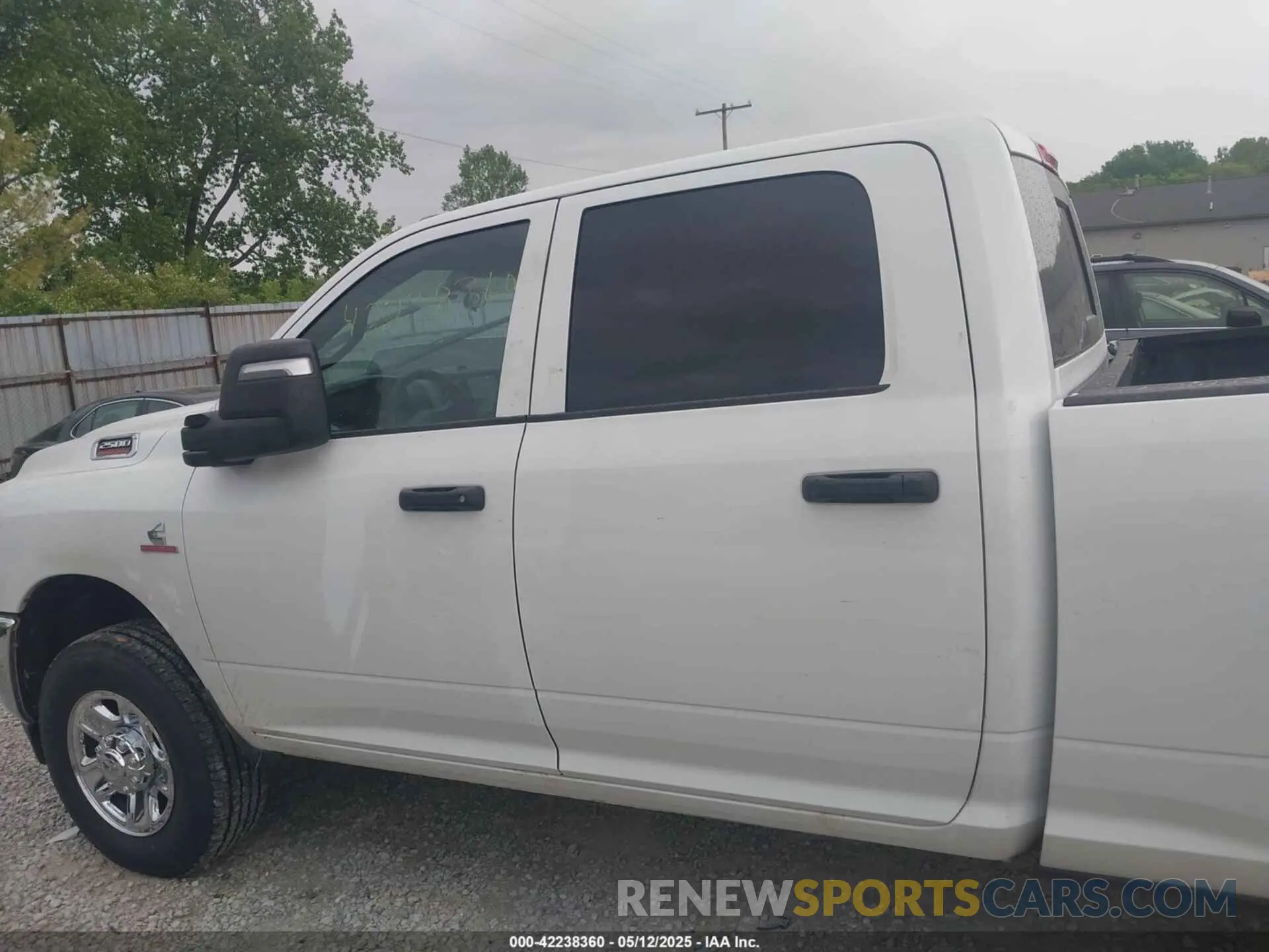 15 Photograph of a damaged car 3C6UR5CL7RG309801 RAM 2500 2024