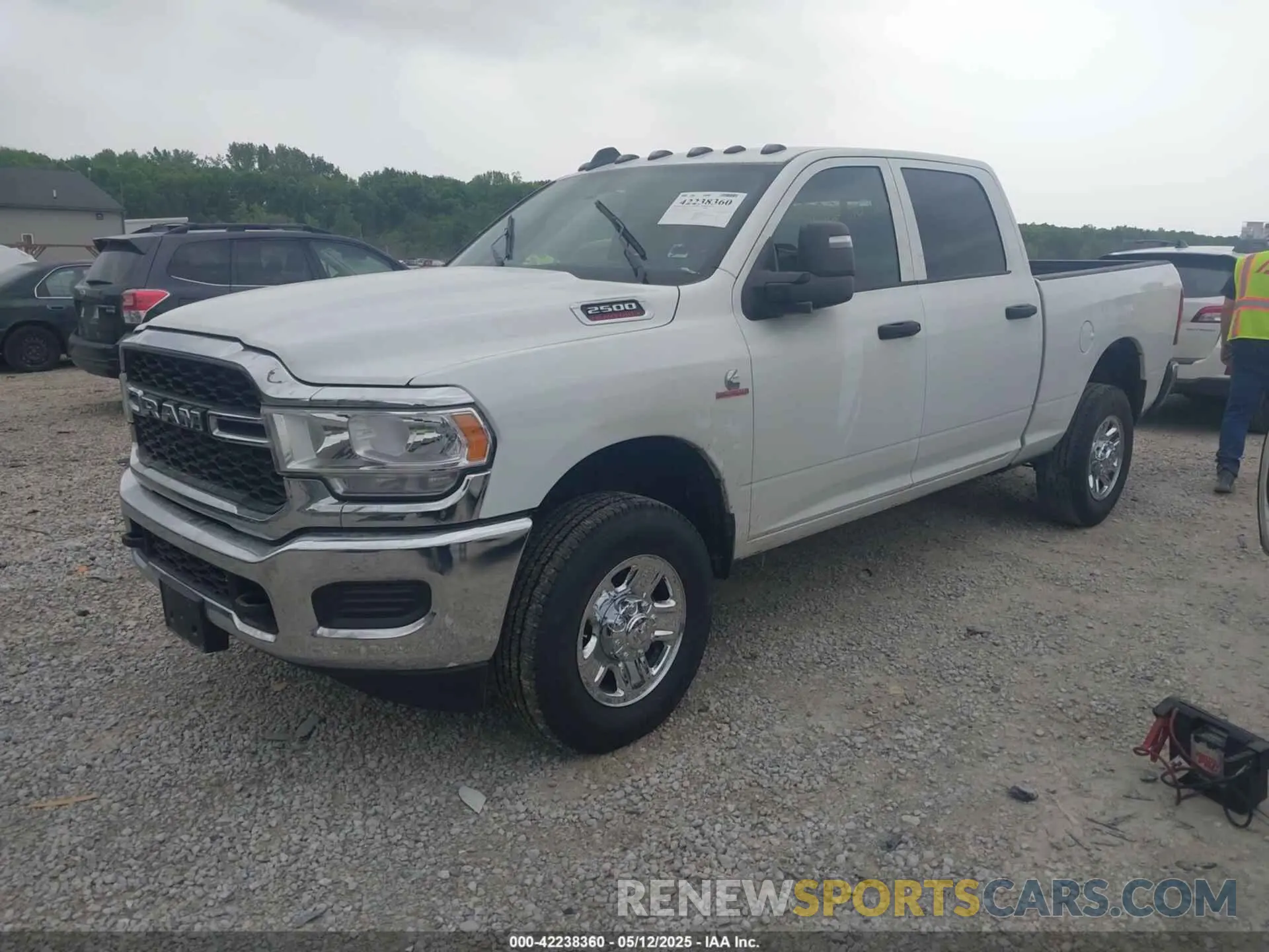 2 Photograph of a damaged car 3C6UR5CL7RG309801 RAM 2500 2024