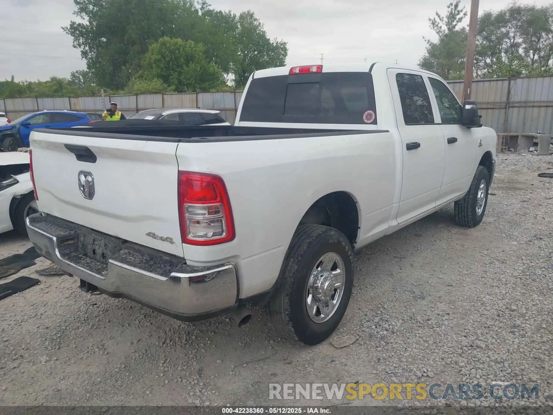 4 Photograph of a damaged car 3C6UR5CL7RG309801 RAM 2500 2024