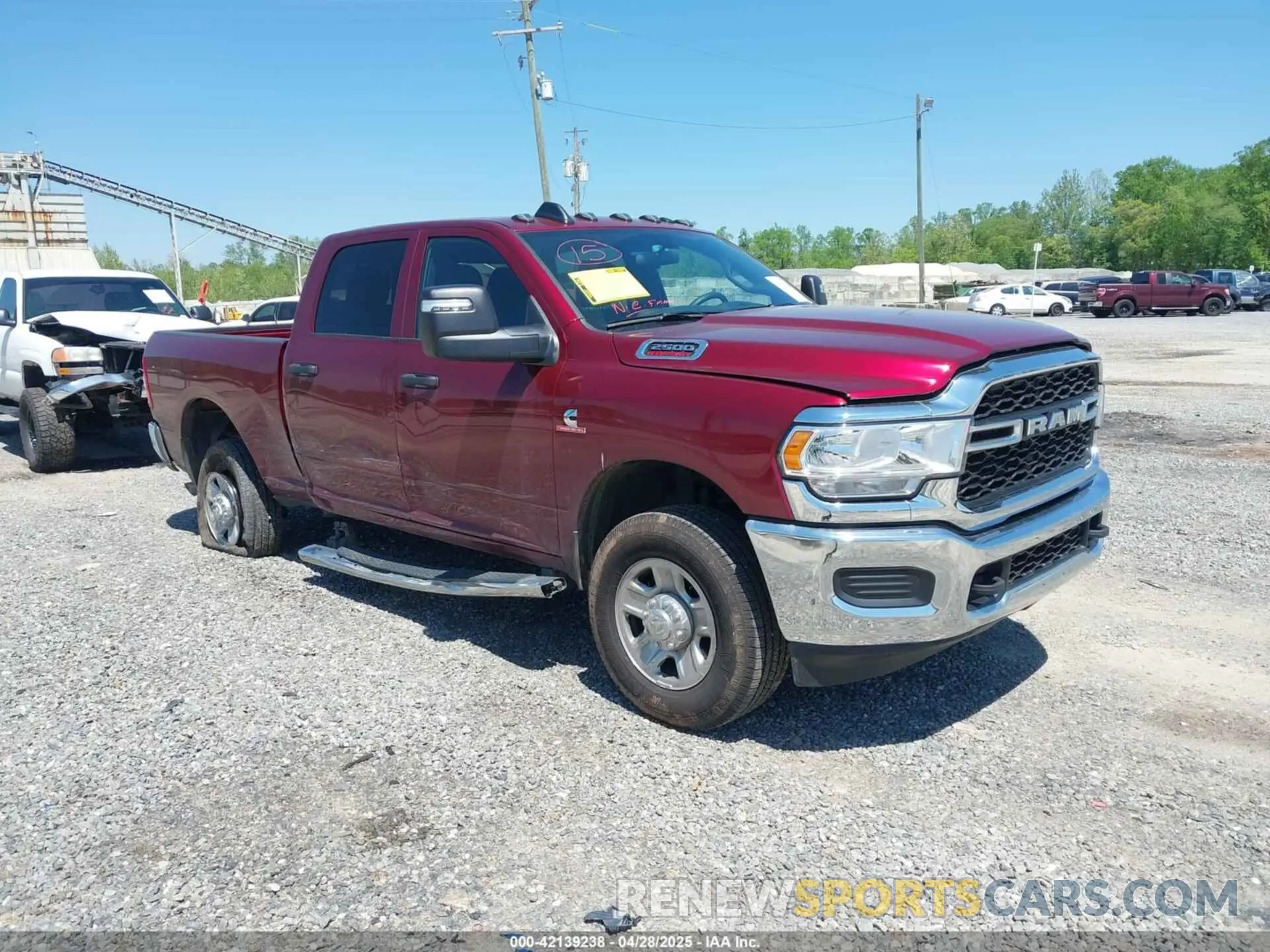 1 Photograph of a damaged car 3C6UR5CL7RG363146 RAM 2500 2024