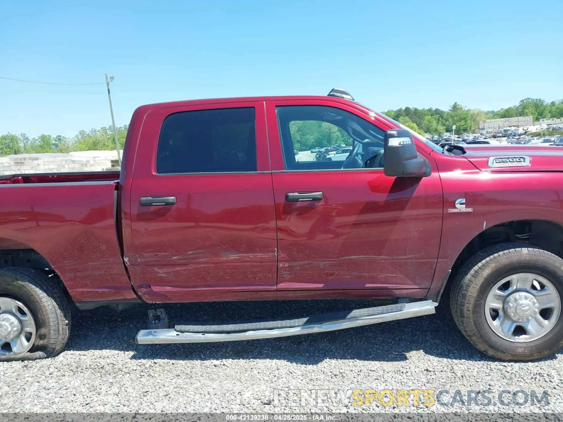 13 Photograph of a damaged car 3C6UR5CL7RG363146 RAM 2500 2024