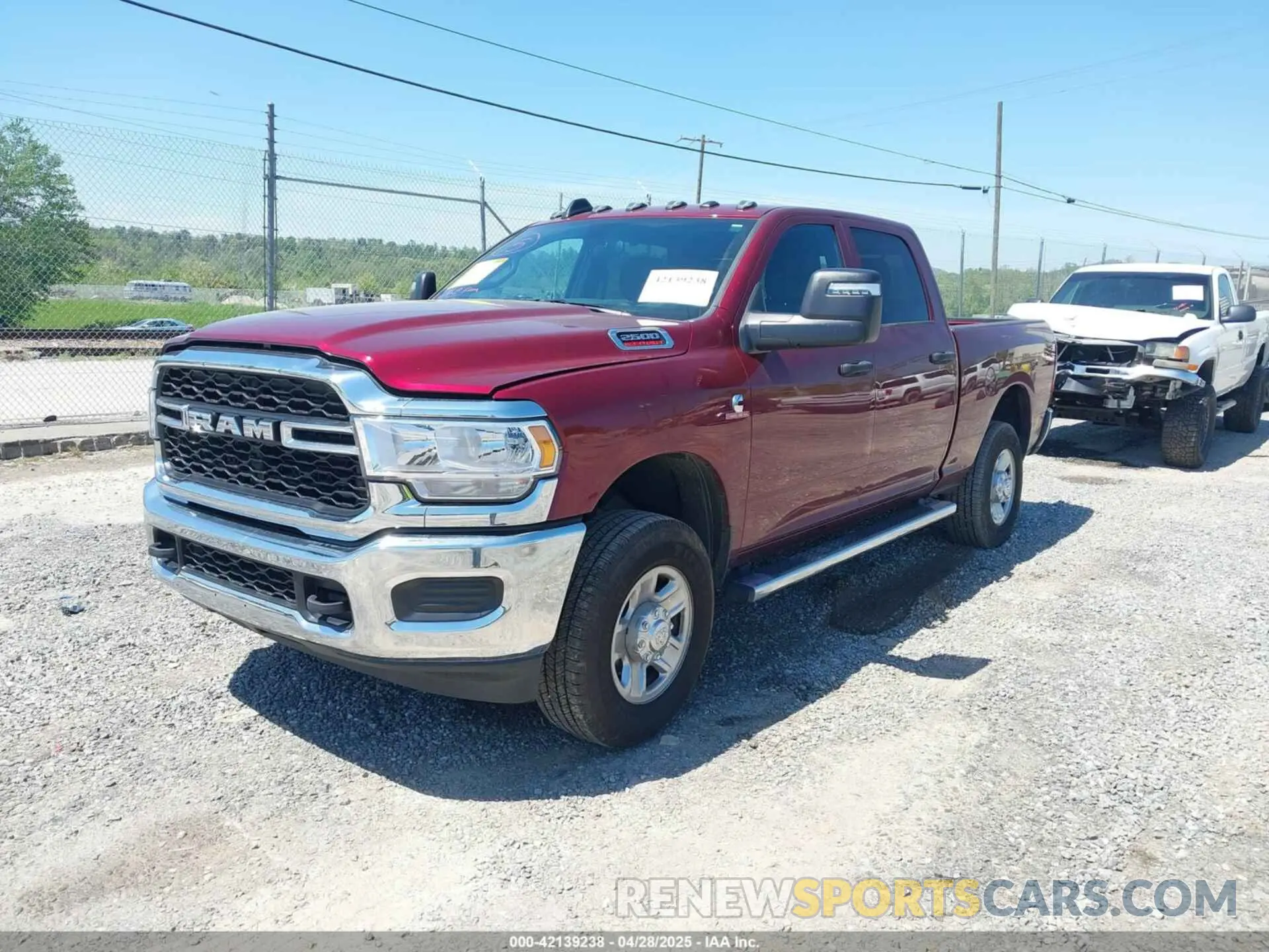 2 Photograph of a damaged car 3C6UR5CL7RG363146 RAM 2500 2024