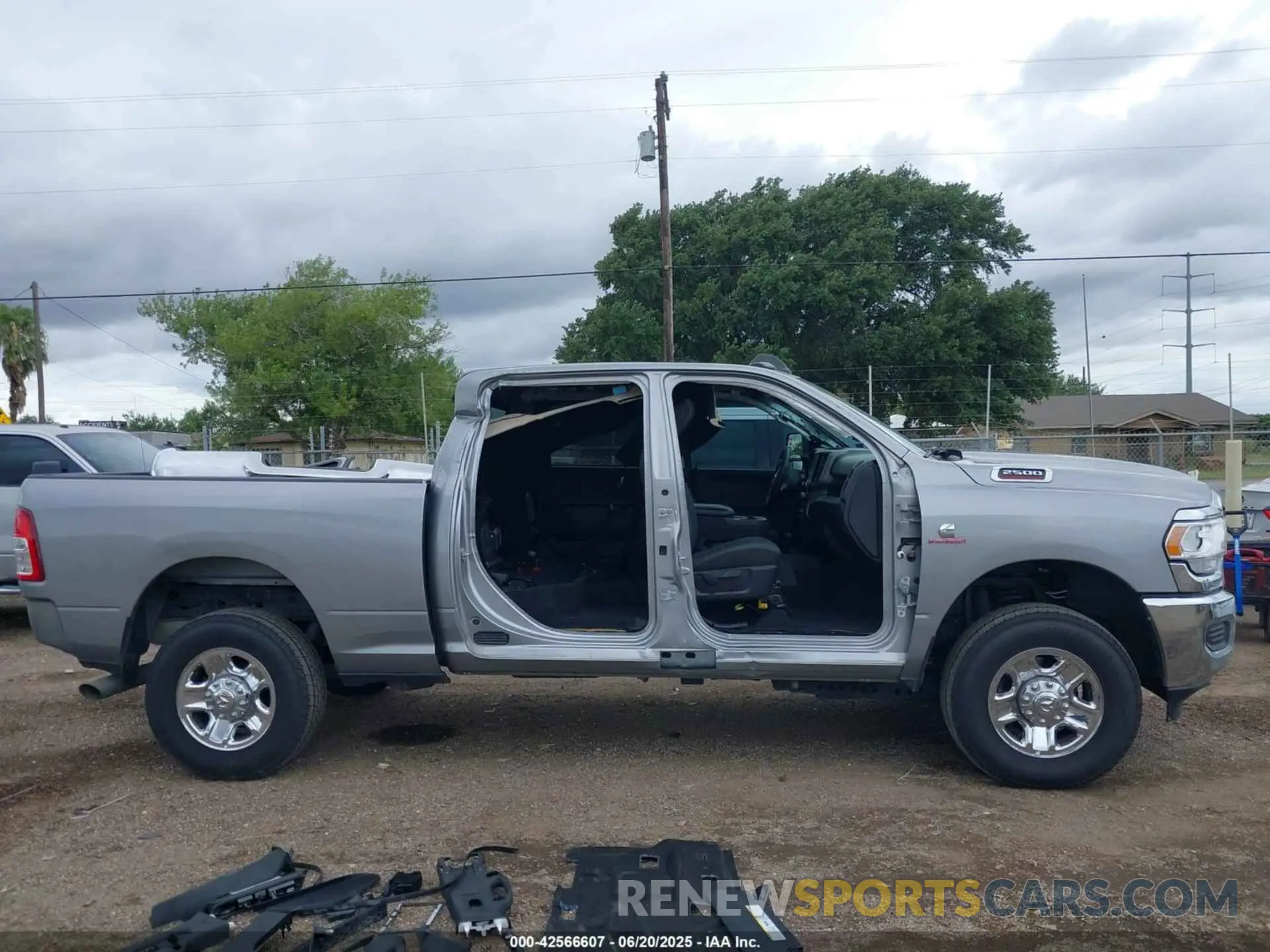 14 Photograph of a damaged car 3C6UR5CL8RG212784 RAM 2500 2024
