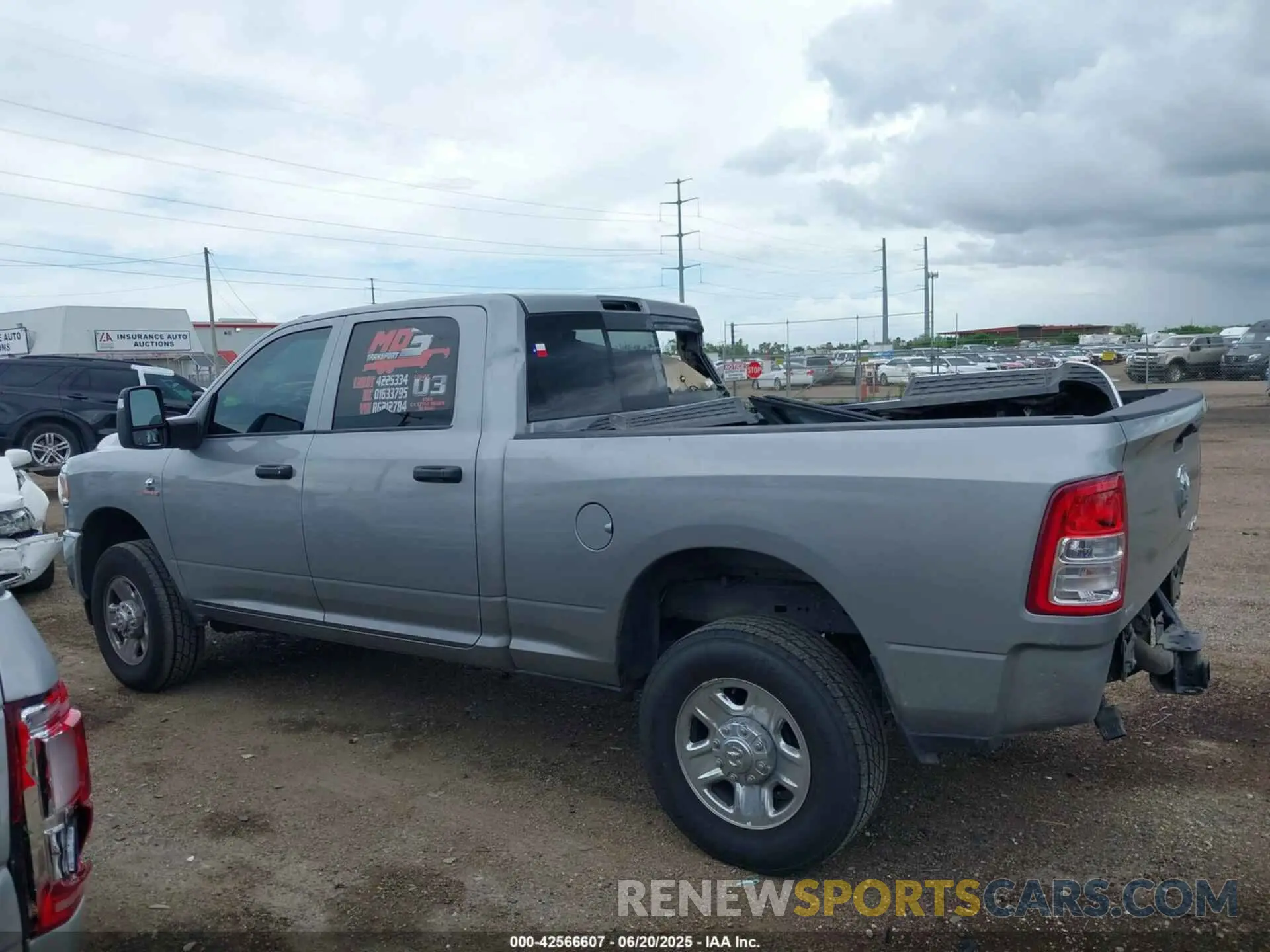 15 Photograph of a damaged car 3C6UR5CL8RG212784 RAM 2500 2024