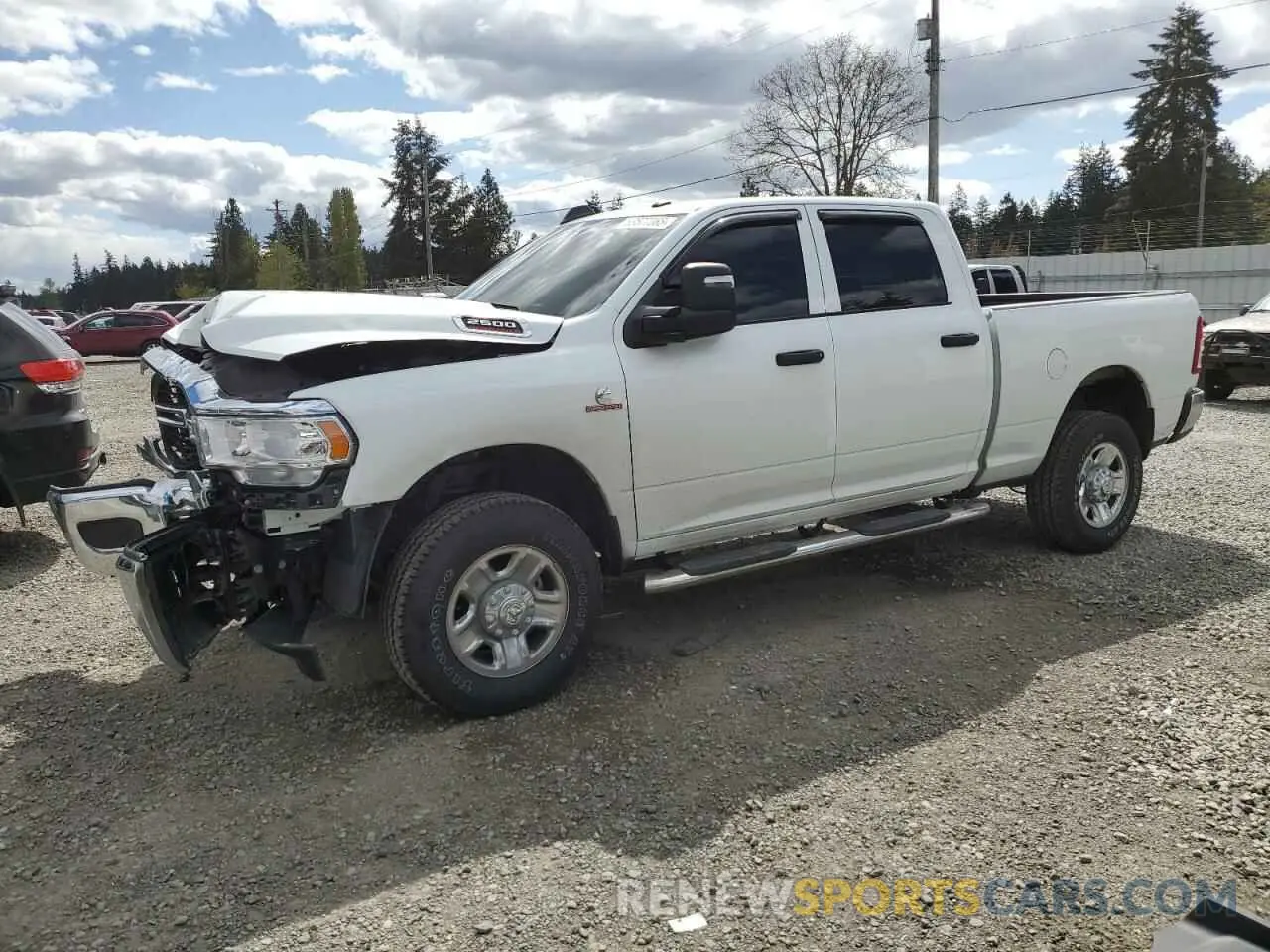 1 Photograph of a damaged car 3C6UR5CL8RG298811 RAM 2500 2024