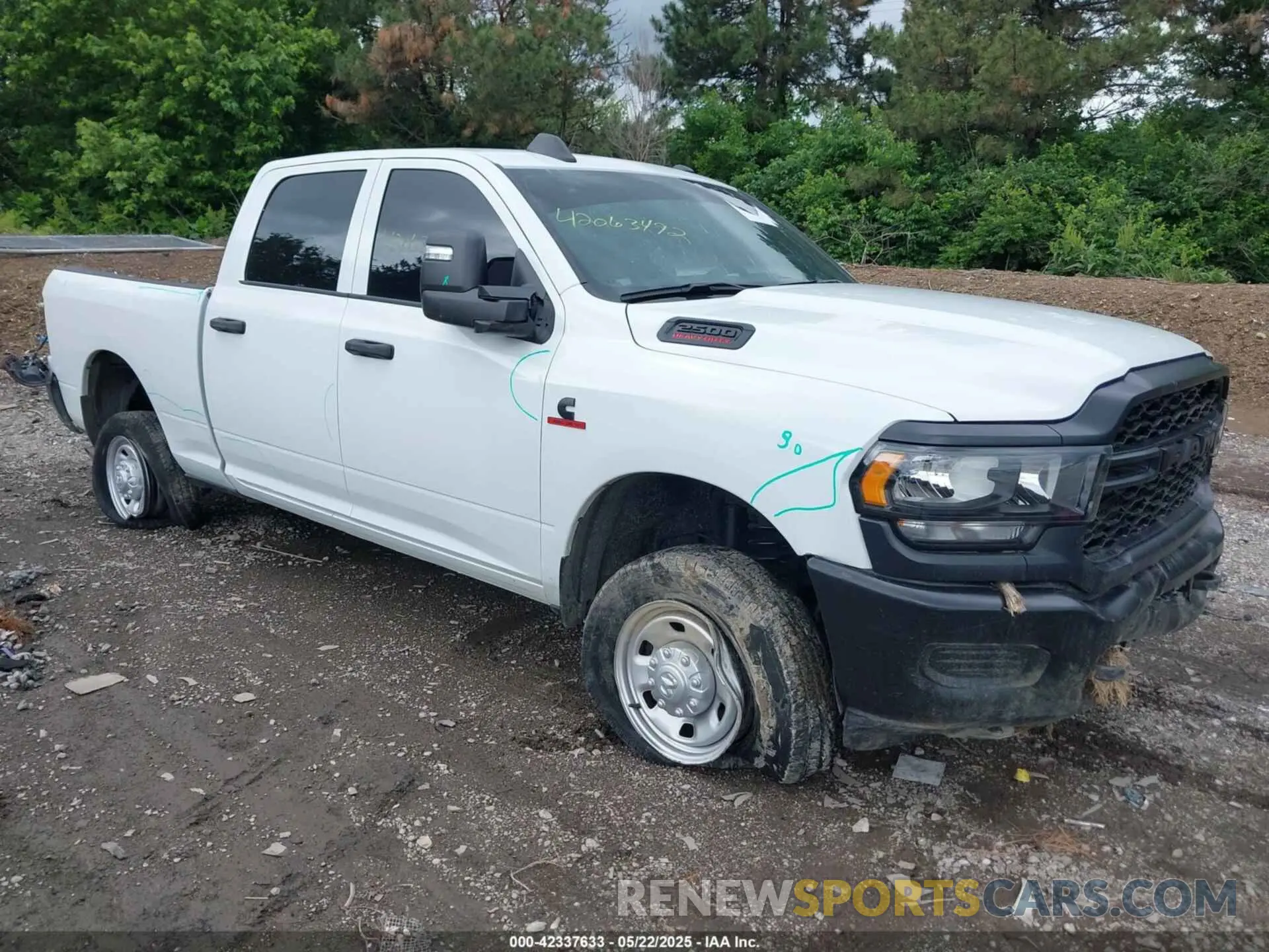 1 Photograph of a damaged car 3C6UR5CL9RG234339 RAM 2500 2024