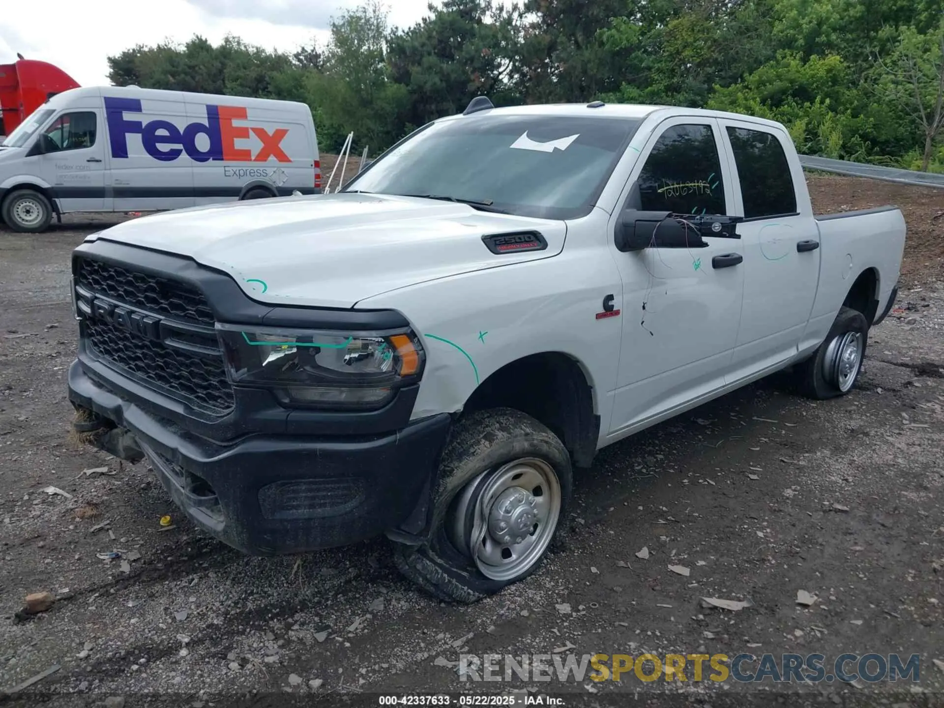 2 Photograph of a damaged car 3C6UR5CL9RG234339 RAM 2500 2024