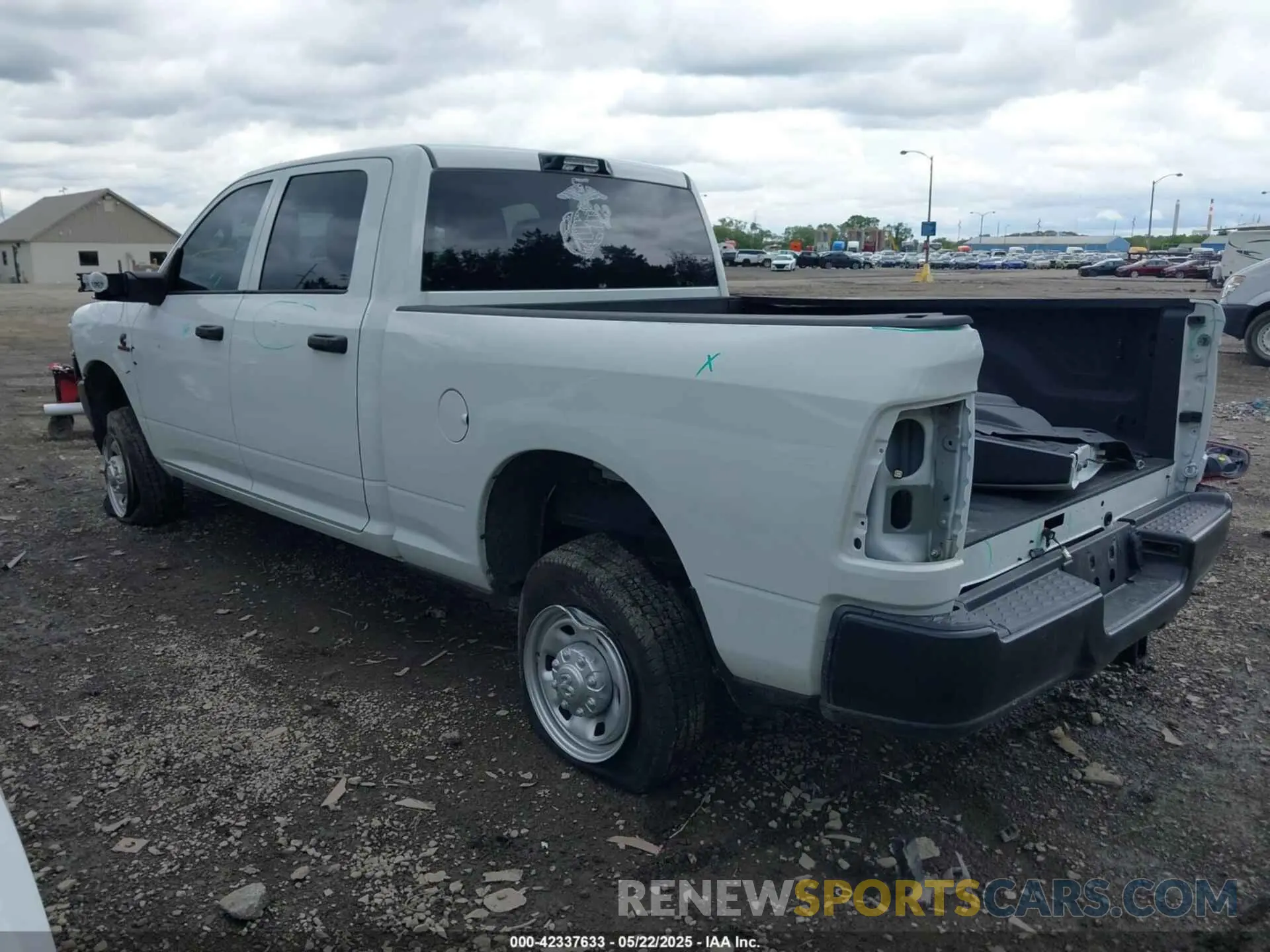 3 Photograph of a damaged car 3C6UR5CL9RG234339 RAM 2500 2024