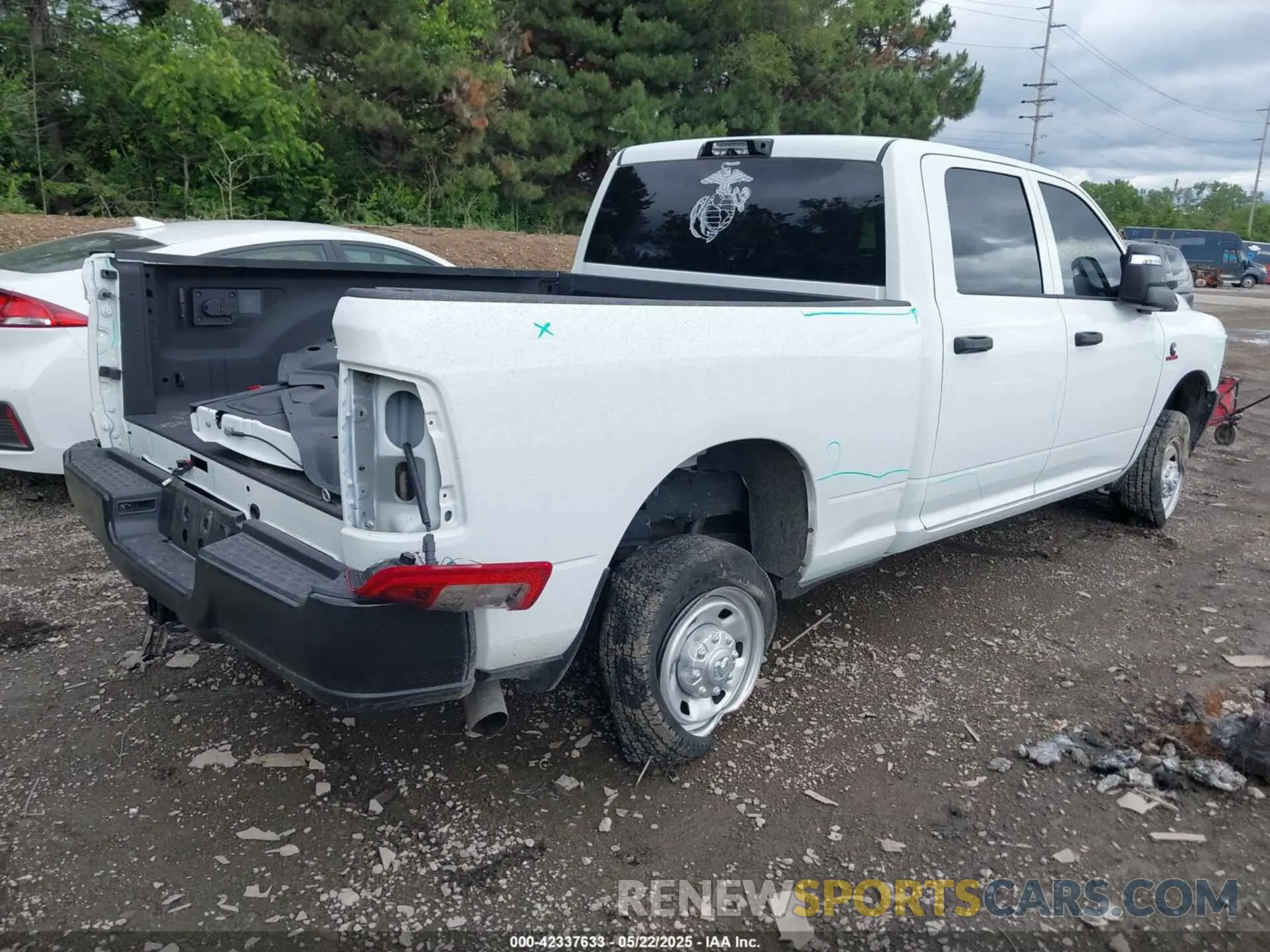 4 Photograph of a damaged car 3C6UR5CL9RG234339 RAM 2500 2024