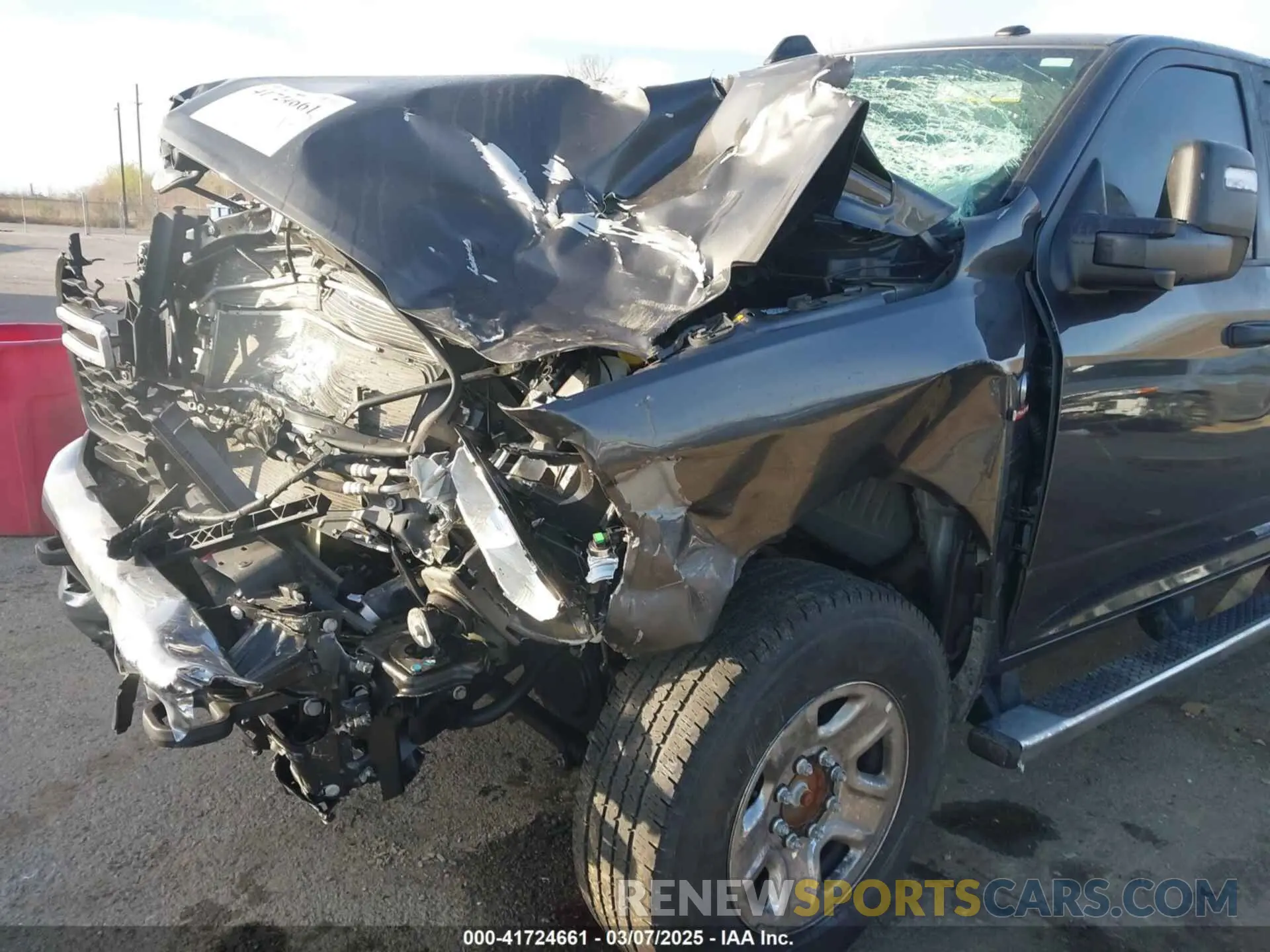 6 Photograph of a damaged car 3C6UR5CL9RG245485 RAM 2500 2024