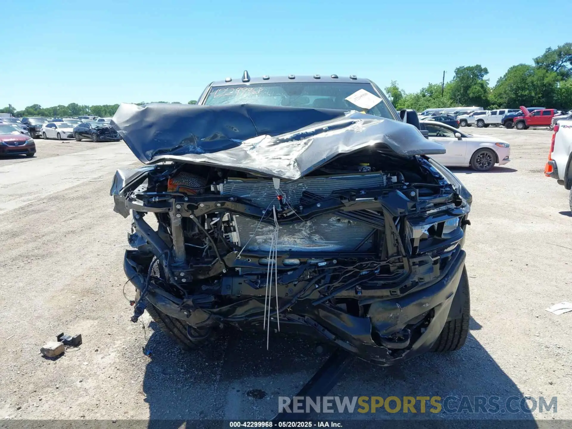 13 Photograph of a damaged car 3C6UR5CL9RG330312 RAM 2500 2024
