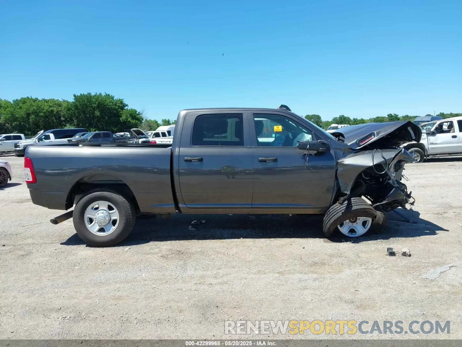 14 Photograph of a damaged car 3C6UR5CL9RG330312 RAM 2500 2024