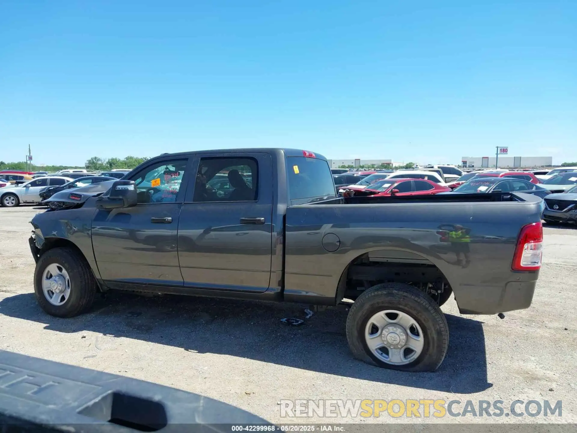 15 Photograph of a damaged car 3C6UR5CL9RG330312 RAM 2500 2024