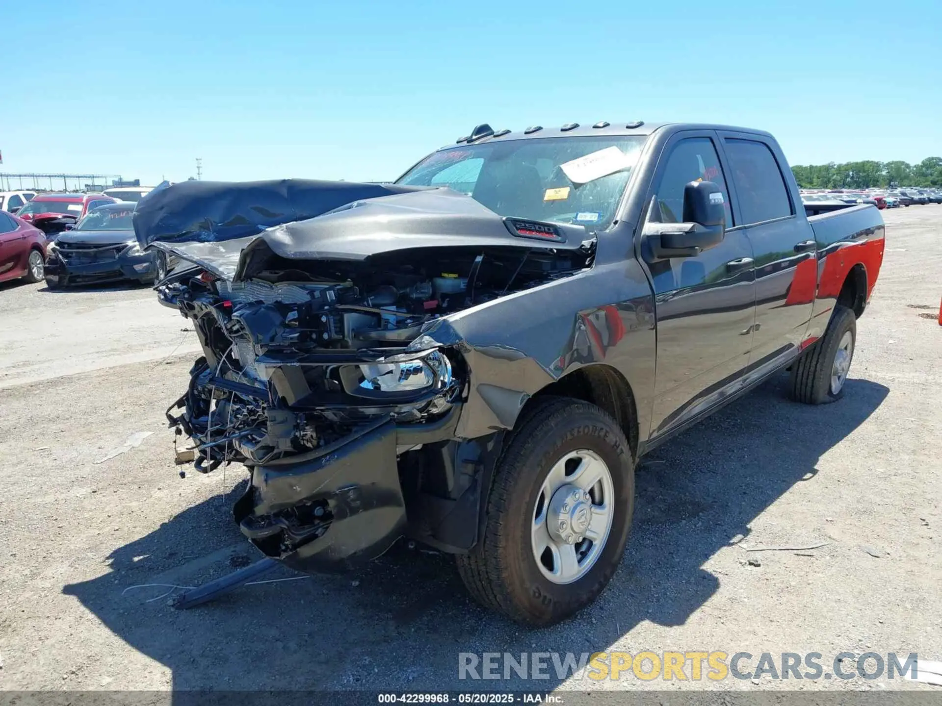 2 Photograph of a damaged car 3C6UR5CL9RG330312 RAM 2500 2024