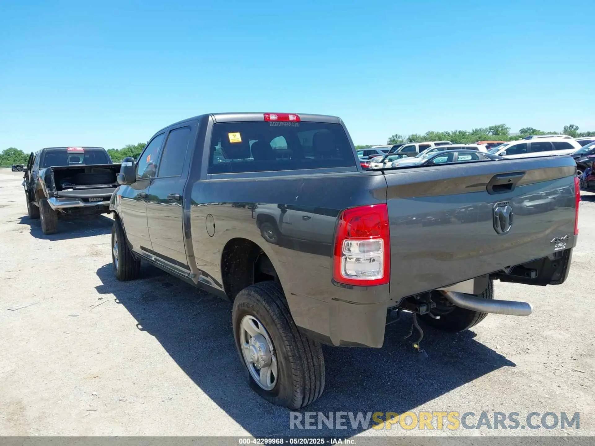 3 Photograph of a damaged car 3C6UR5CL9RG330312 RAM 2500 2024