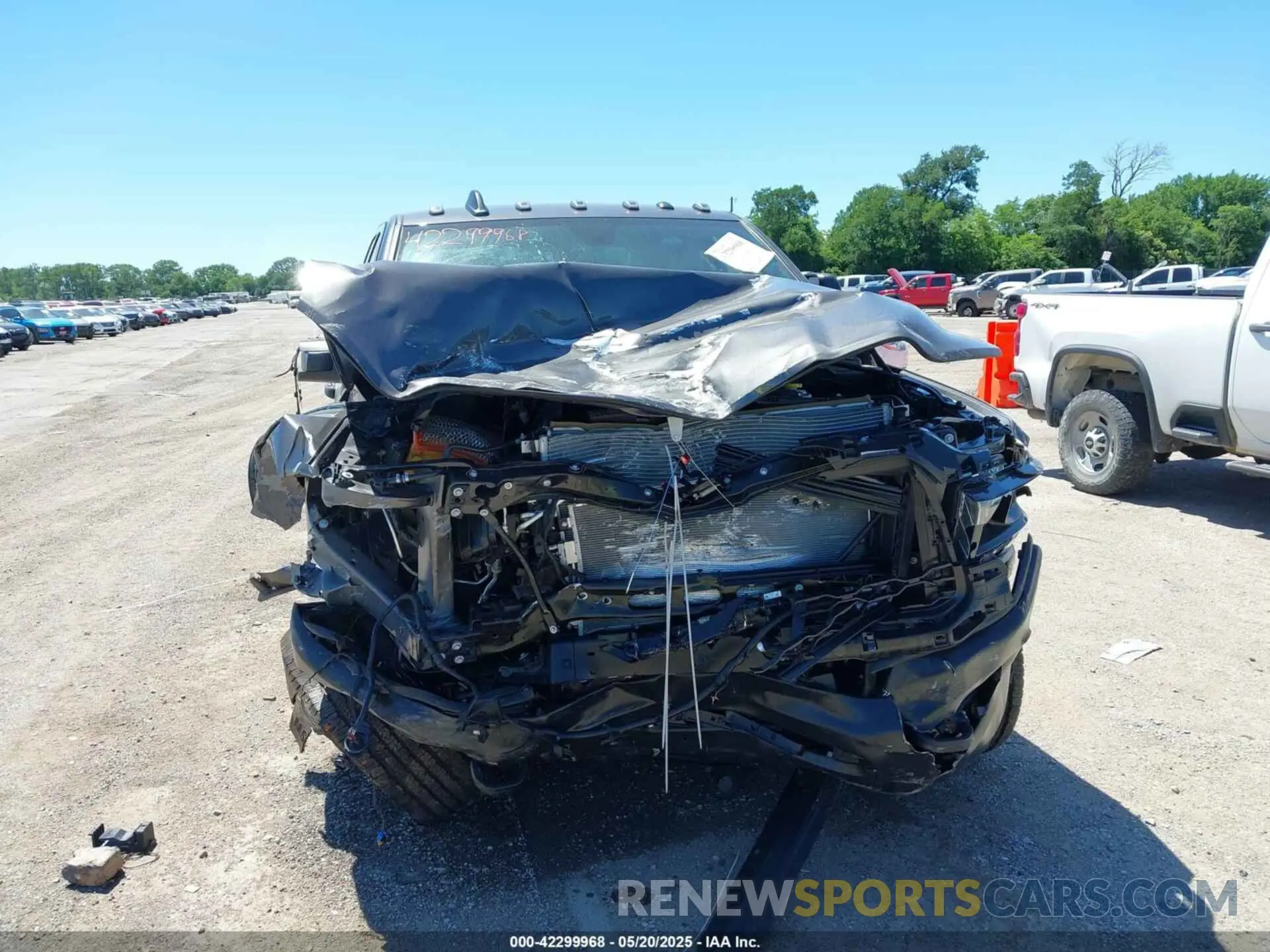 6 Photograph of a damaged car 3C6UR5CL9RG330312 RAM 2500 2024