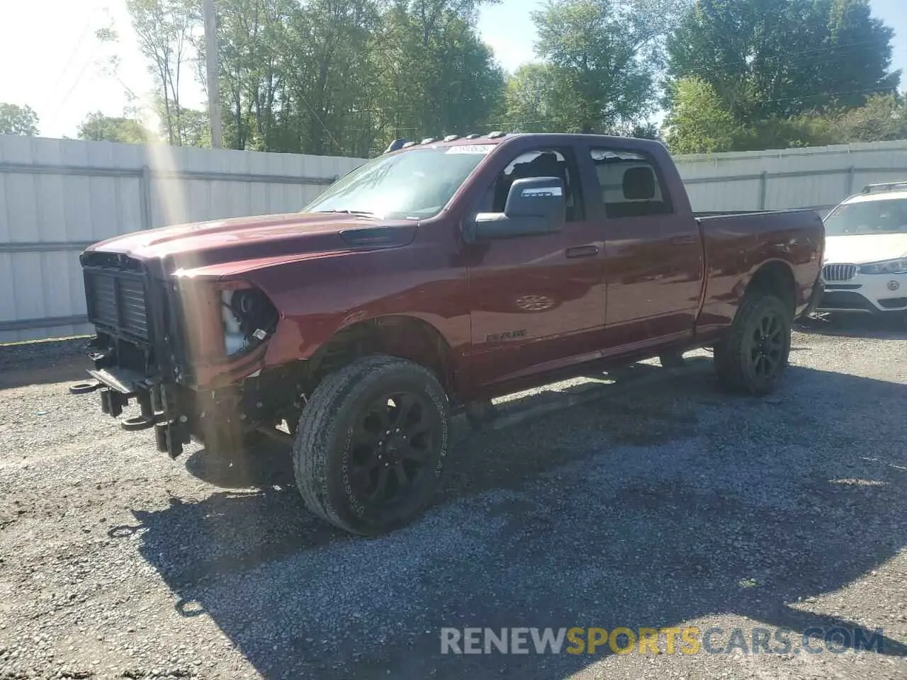 1 Photograph of a damaged car 3C6UR5DJ0RG178028 RAM 2500 2024