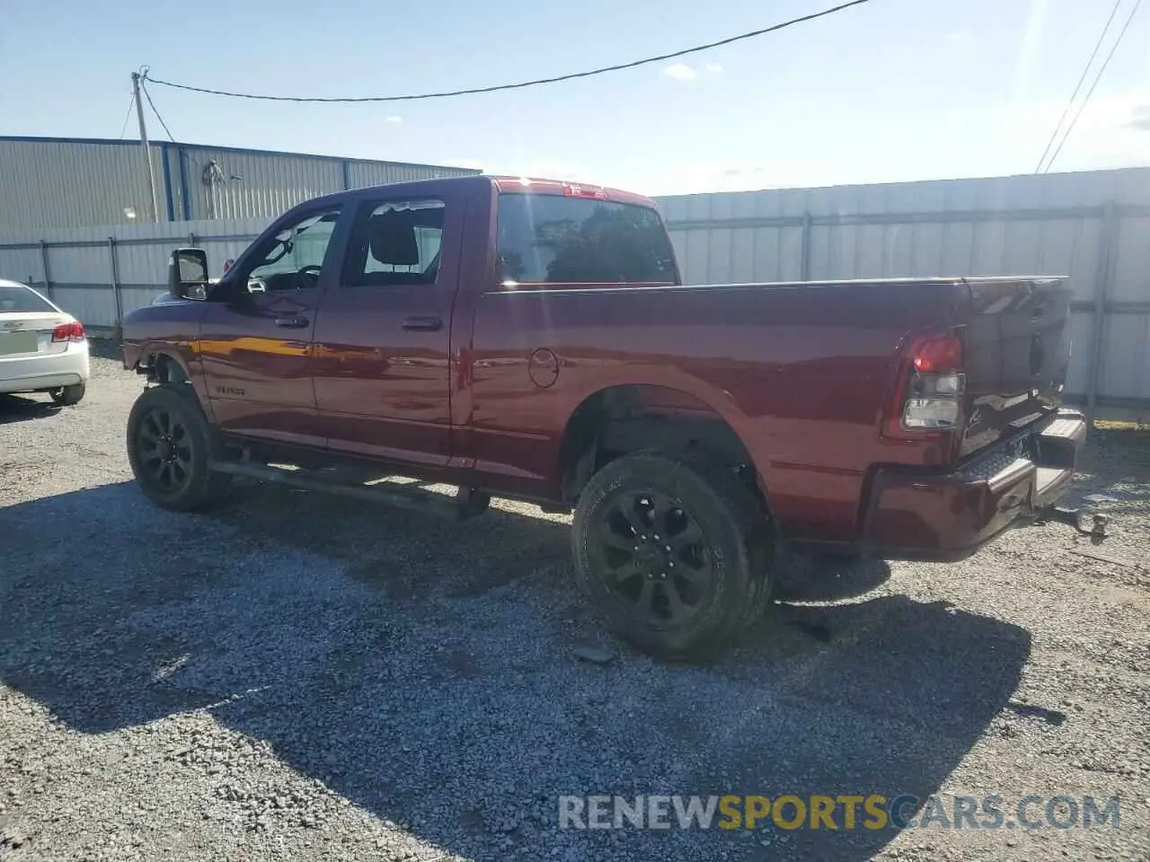 2 Photograph of a damaged car 3C6UR5DJ0RG178028 RAM 2500 2024