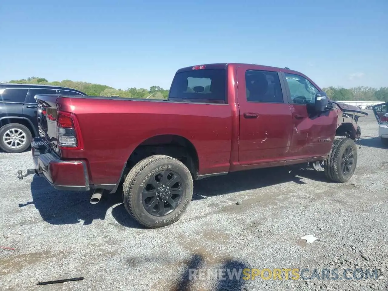 3 Photograph of a damaged car 3C6UR5DJ0RG178028 RAM 2500 2024
