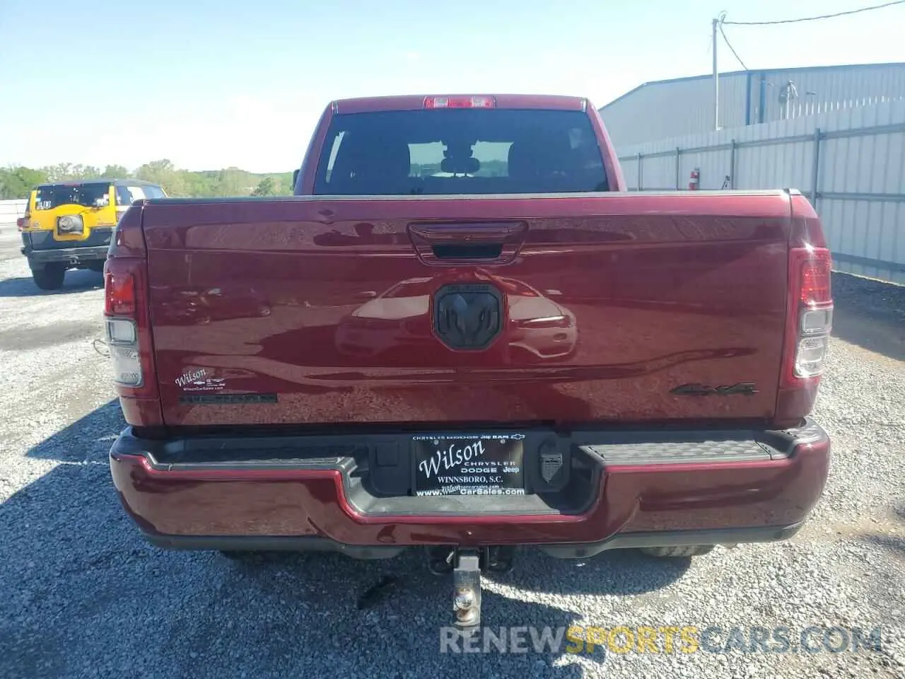 6 Photograph of a damaged car 3C6UR5DJ0RG178028 RAM 2500 2024