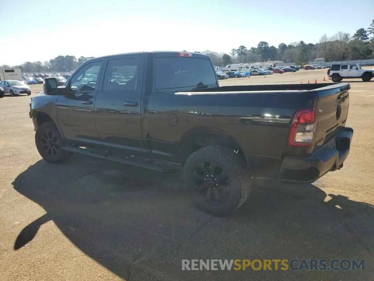2 Photograph of a damaged car 3C6UR5DJ1RG115701 RAM 2500 2024