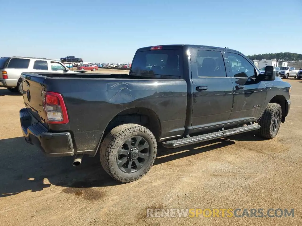 3 Photograph of a damaged car 3C6UR5DJ1RG115701 RAM 2500 2024