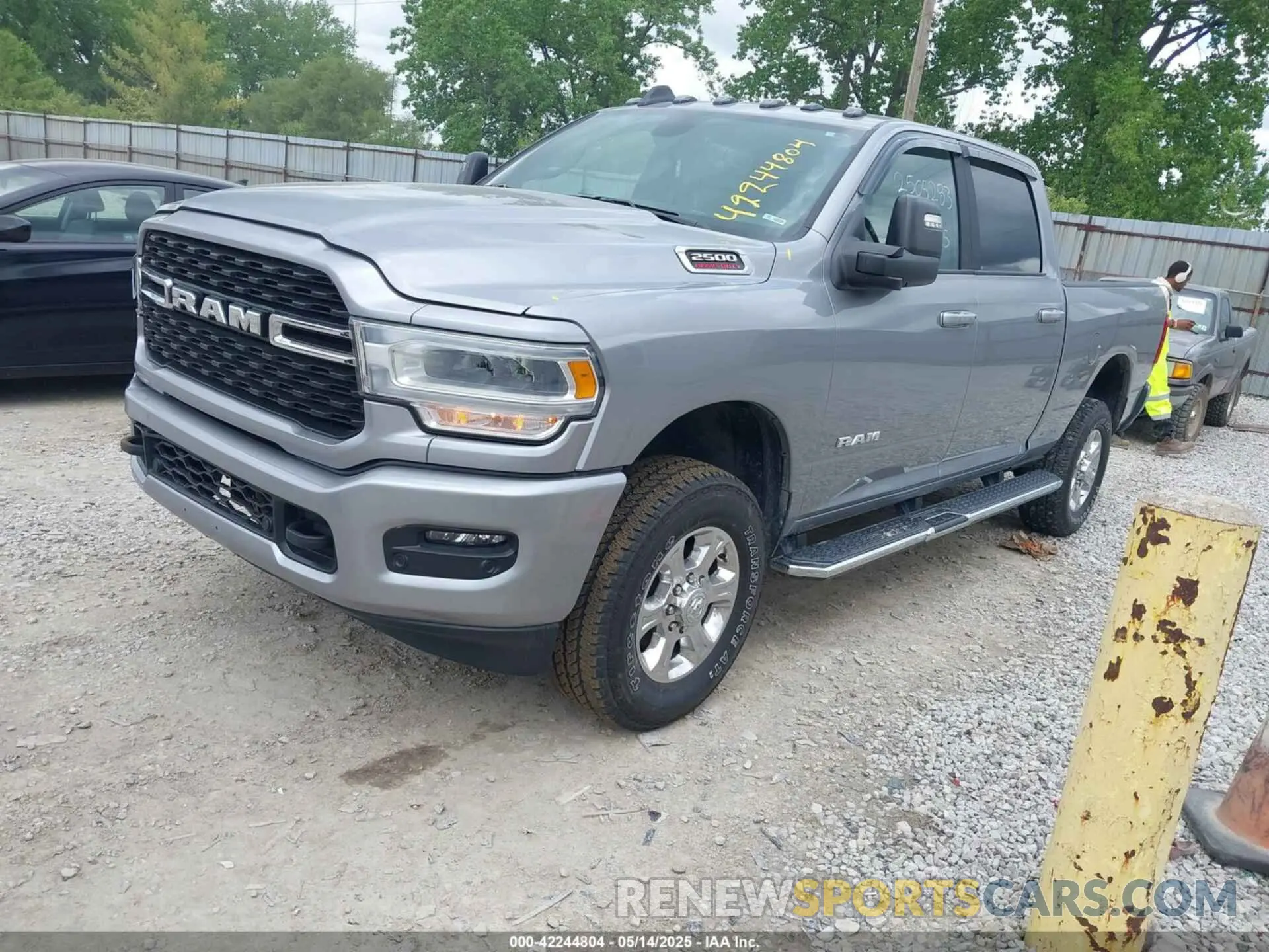 2 Photograph of a damaged car 3C6UR5DJ1RG186140 RAM 2500 2024
