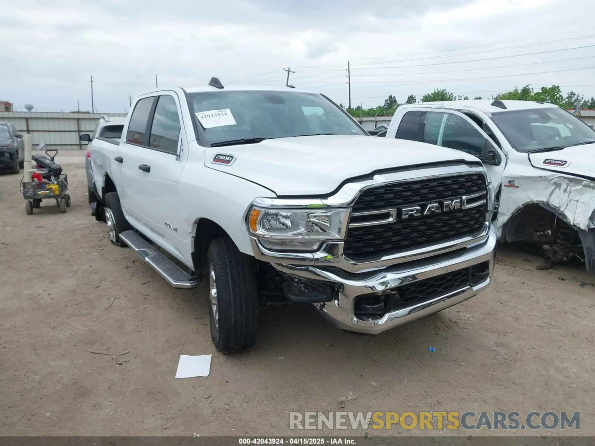 1 Photograph of a damaged car 3C6UR5DJ1RG249902 RAM 2500 2024