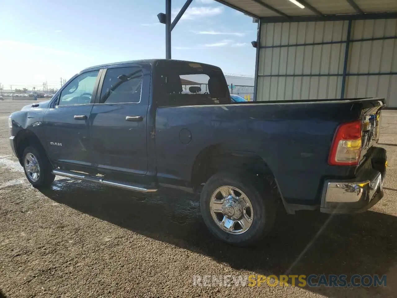 2 Photograph of a damaged car 3C6UR5DJ1RG348459 RAM 2500 2024