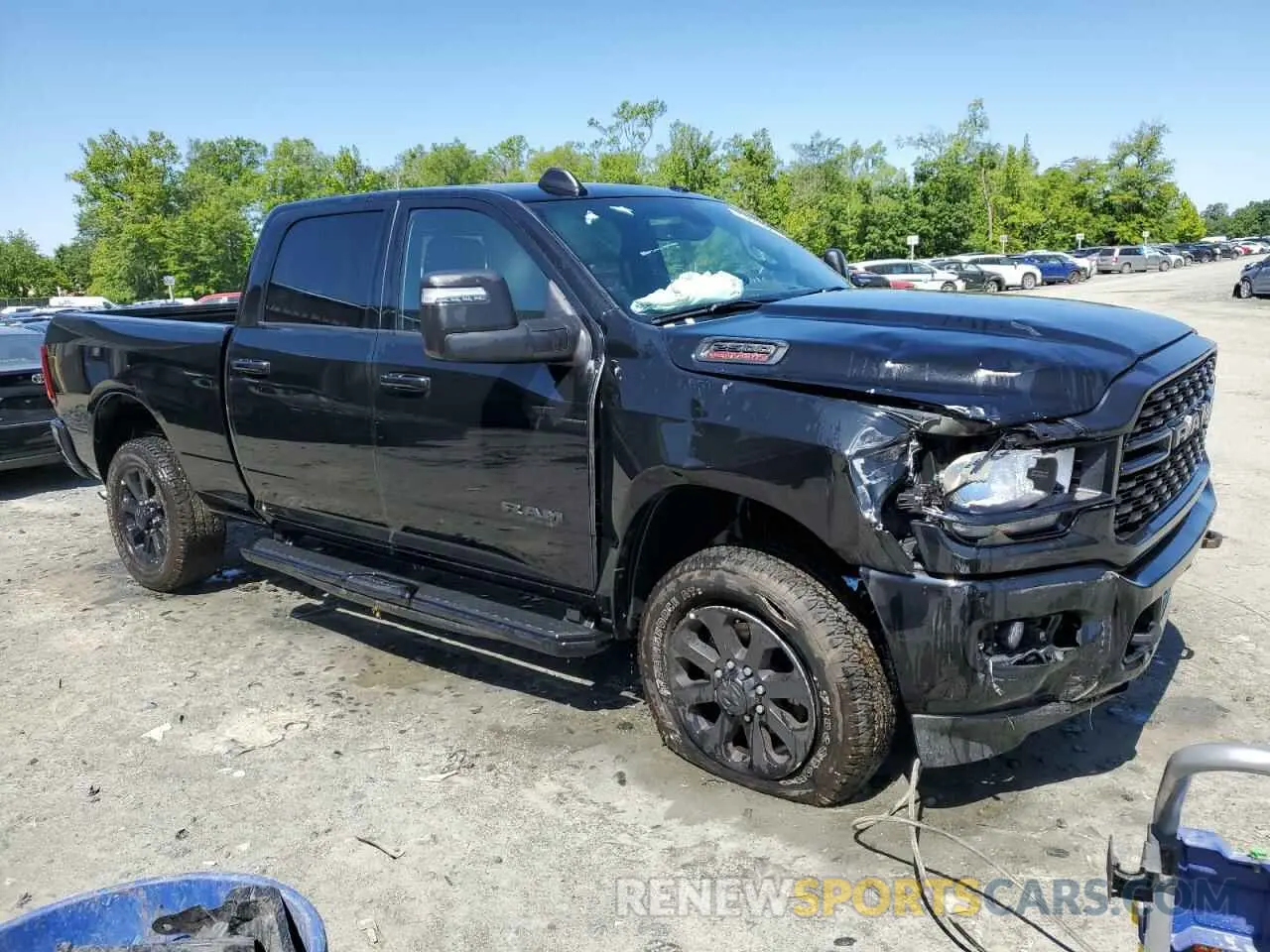 4 Photograph of a damaged car 3C6UR5DJ1RG372406 RAM 2500 2024