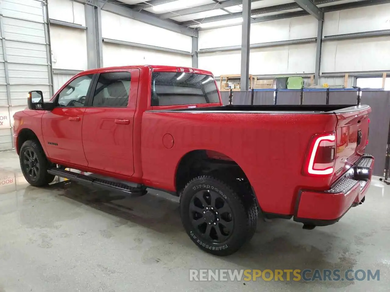 2 Photograph of a damaged car 3C6UR5DJ1RG397502 RAM 2500 2024