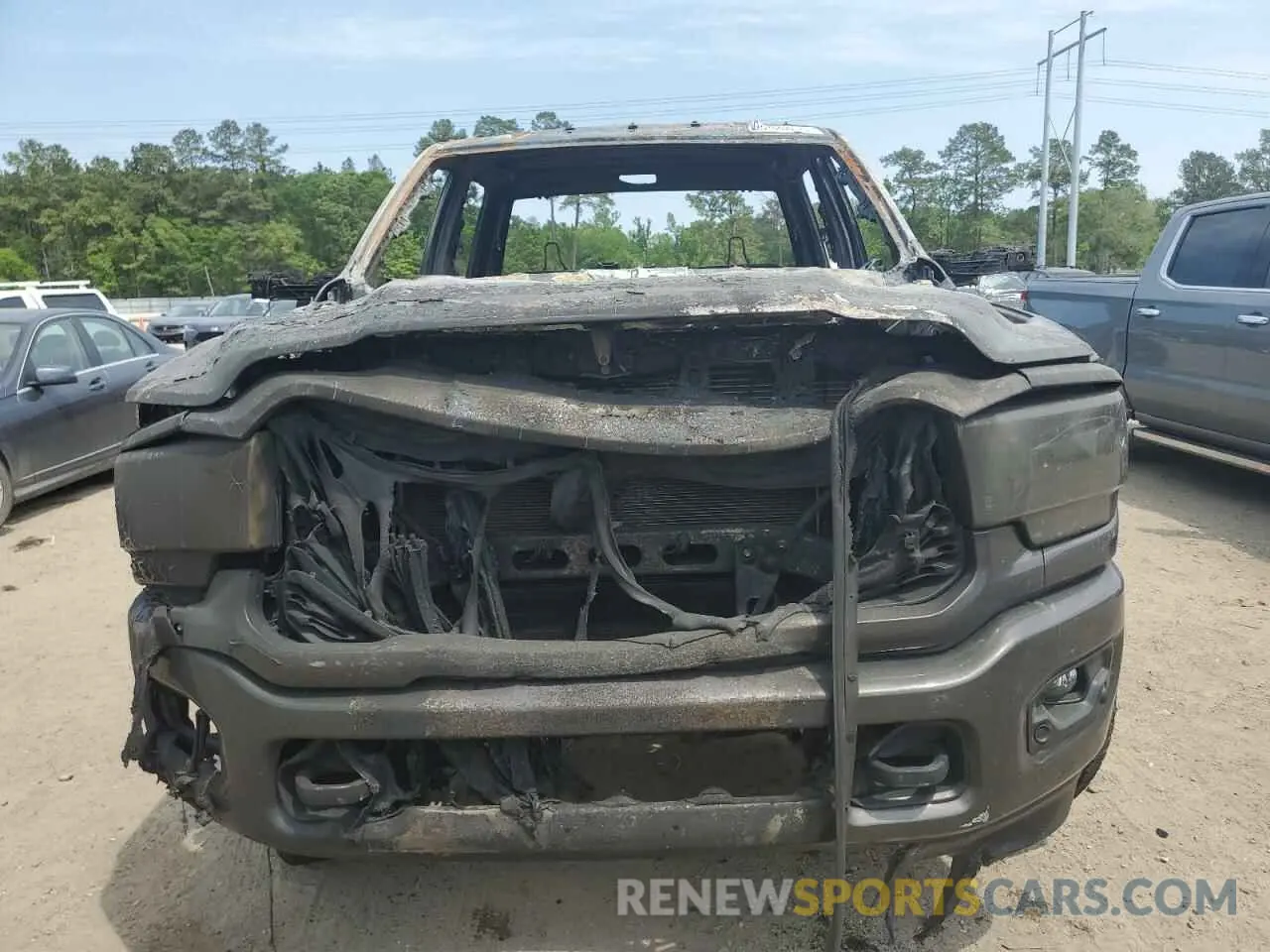 5 Photograph of a damaged car 3C6UR5DJ2RG186129 RAM 2500 2024