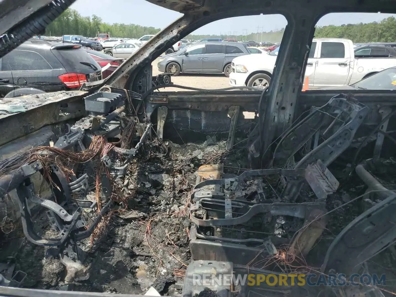 7 Photograph of a damaged car 3C6UR5DJ2RG186129 RAM 2500 2024