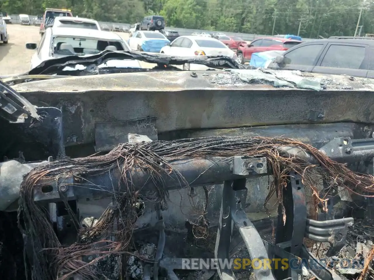 9 Photograph of a damaged car 3C6UR5DJ2RG186129 RAM 2500 2024