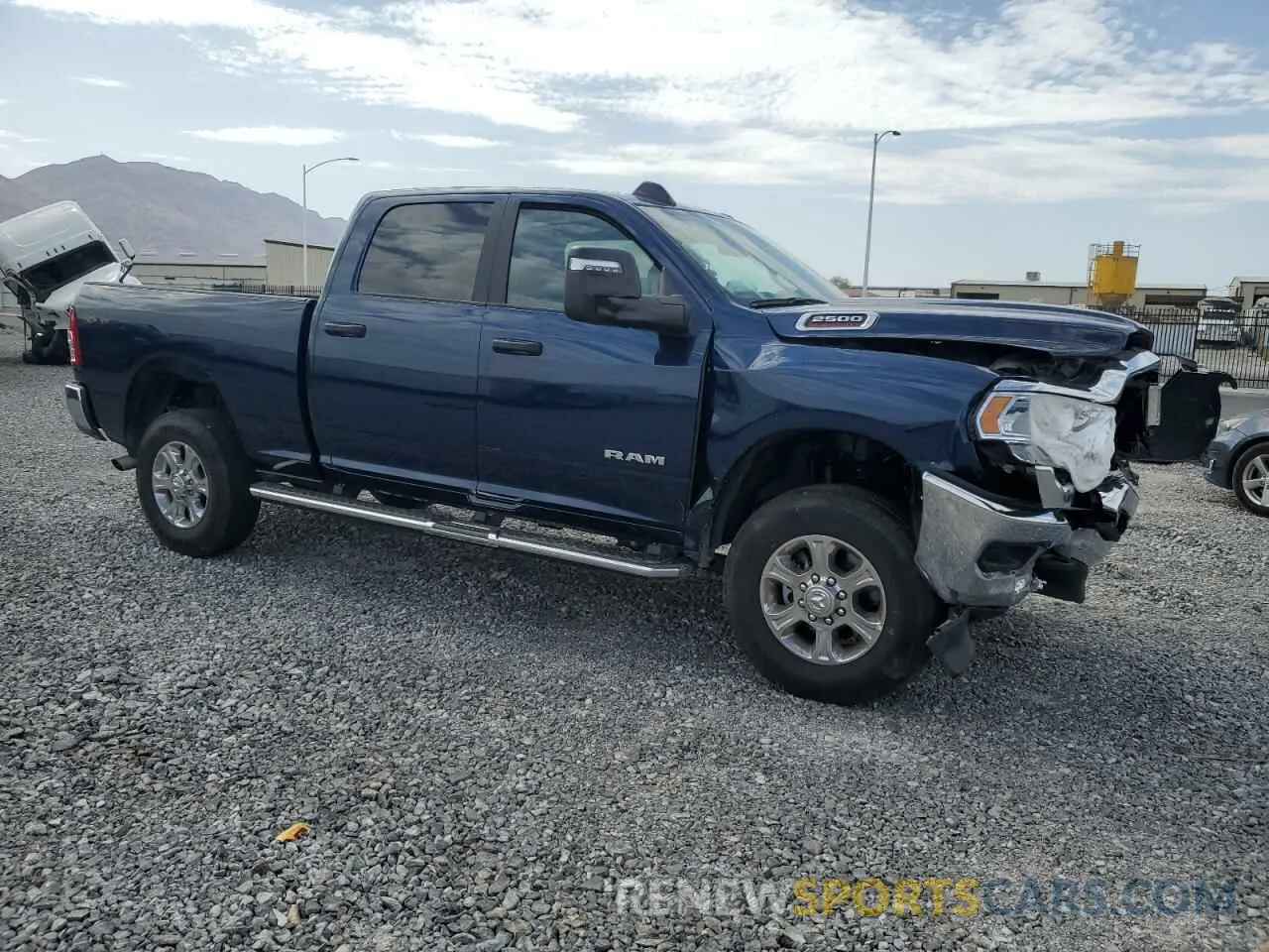 4 Photograph of a damaged car 3C6UR5DJ2RG323442 RAM 2500 2024