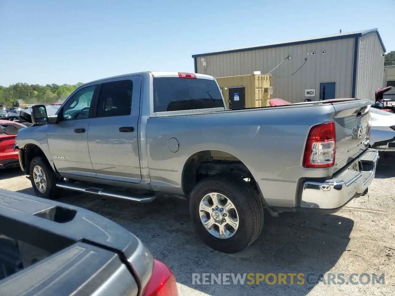 2 Photograph of a damaged car 3C6UR5DJ2RG354836 RAM 2500 2024