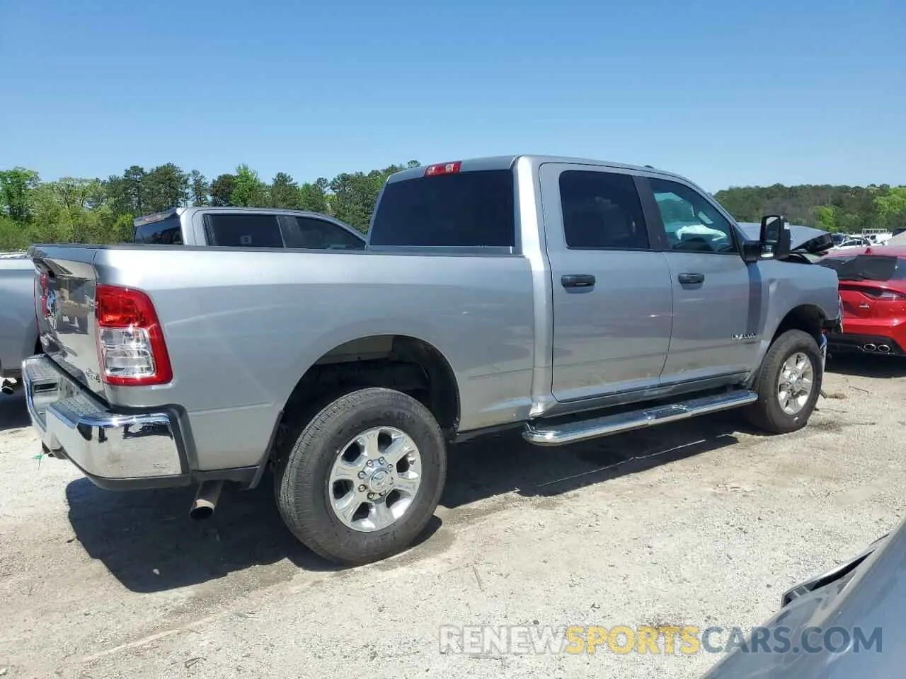 3 Photograph of a damaged car 3C6UR5DJ2RG354836 RAM 2500 2024