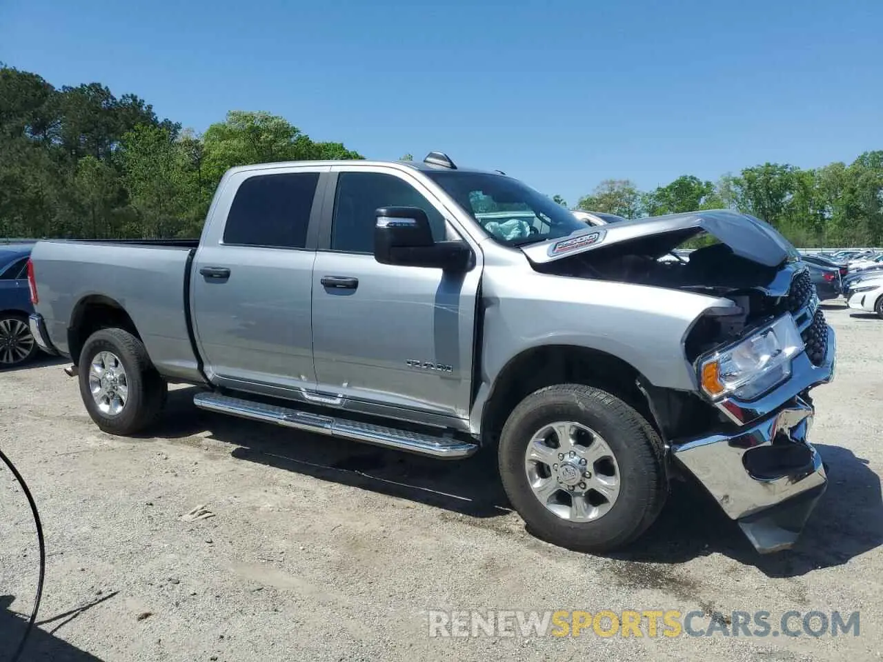 4 Photograph of a damaged car 3C6UR5DJ2RG354836 RAM 2500 2024