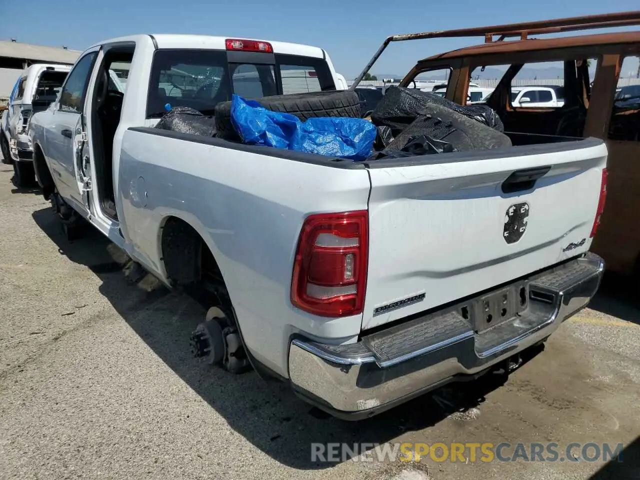 2 Photograph of a damaged car 3C6UR5DJ2RG373340 RAM 2500 2024