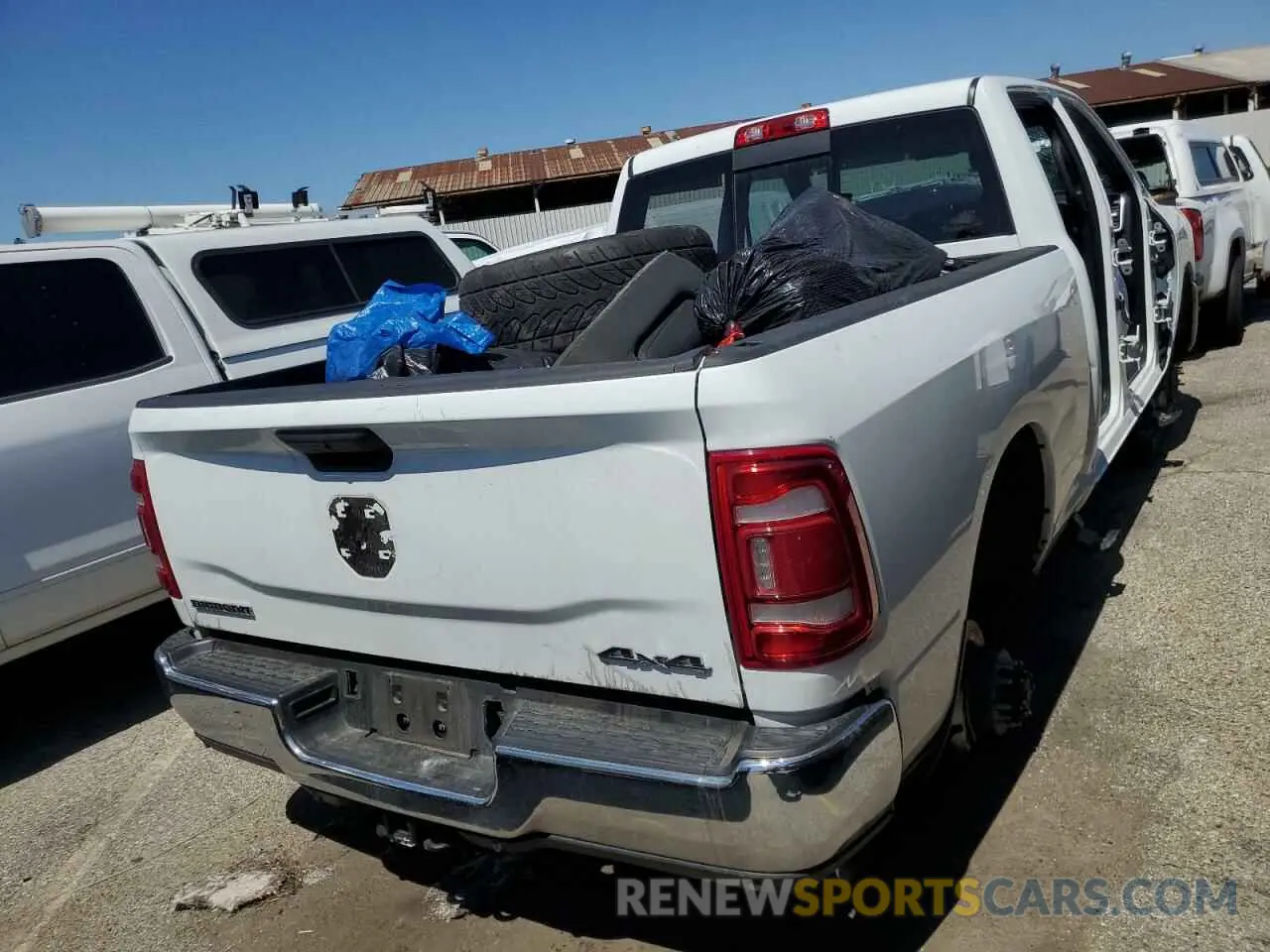 3 Photograph of a damaged car 3C6UR5DJ2RG373340 RAM 2500 2024